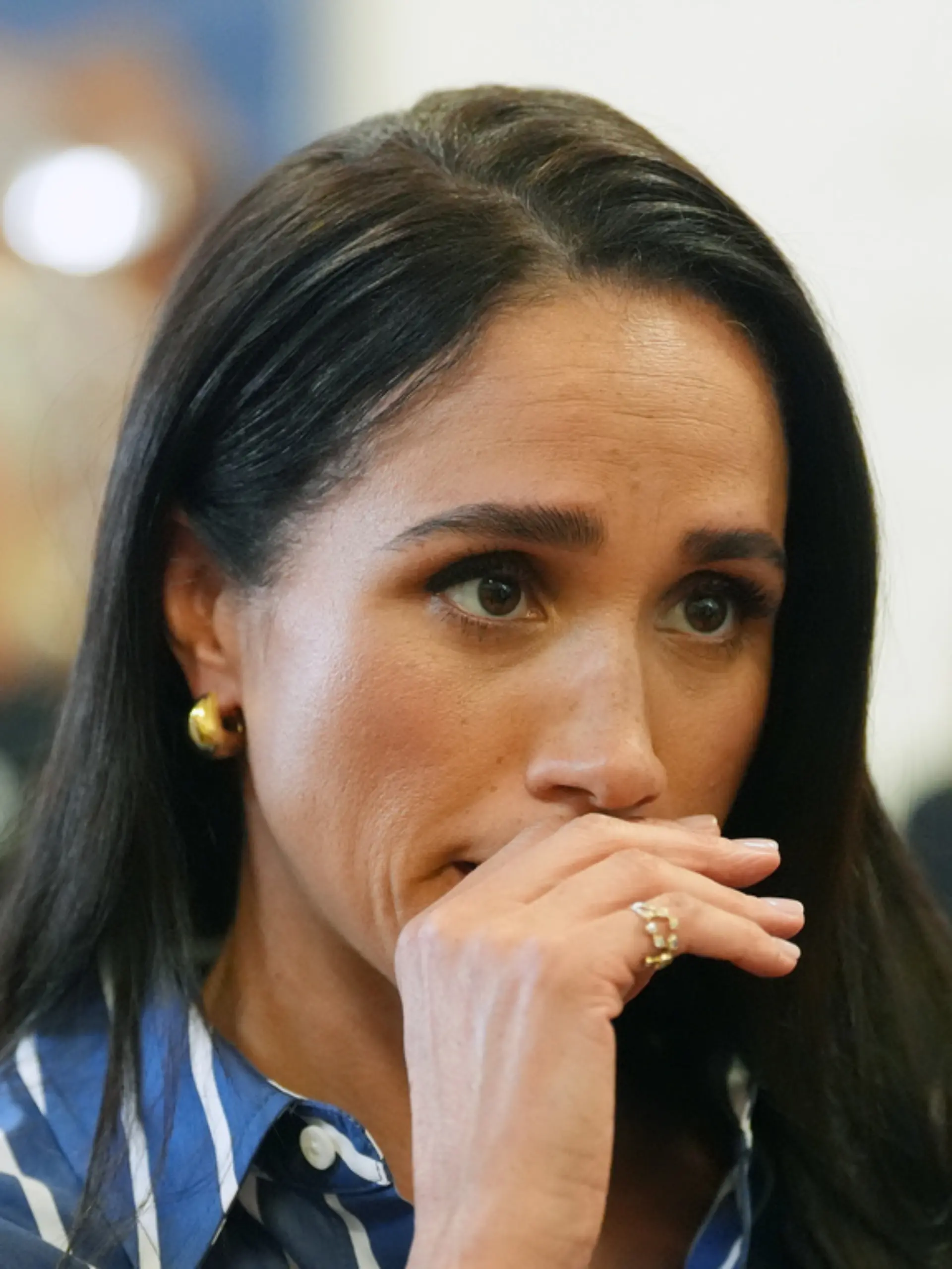 Meghan Markle, the Duchess of Sussex, meets volunteer first responders from the Bondi Surf Bathers' Life Saving Club during a visit to Bondi Beach, Australia, Friday, April 17, 2026. (Jonathan Brady/Pool Photo via AP)