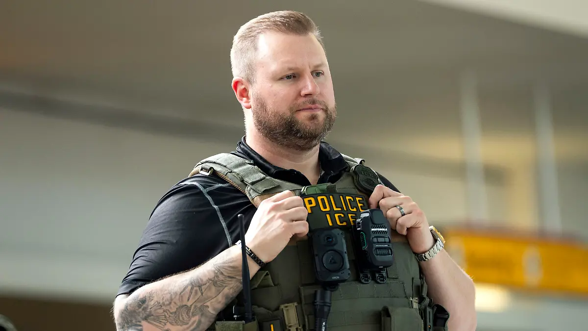 An ICE agent assists a traveler at Baltimore/Washington International Thurgood Marshall Airport (BWI) in Baltimore, Maryland on Monday, March 30, 2026. Airports across the country began returning to usual security wait times as TSA agents began receiving their first paychecks since a partial government shutdown began on February 14. Photo by Bonnie Cash/UPI Photo via Newscom picture alliance
