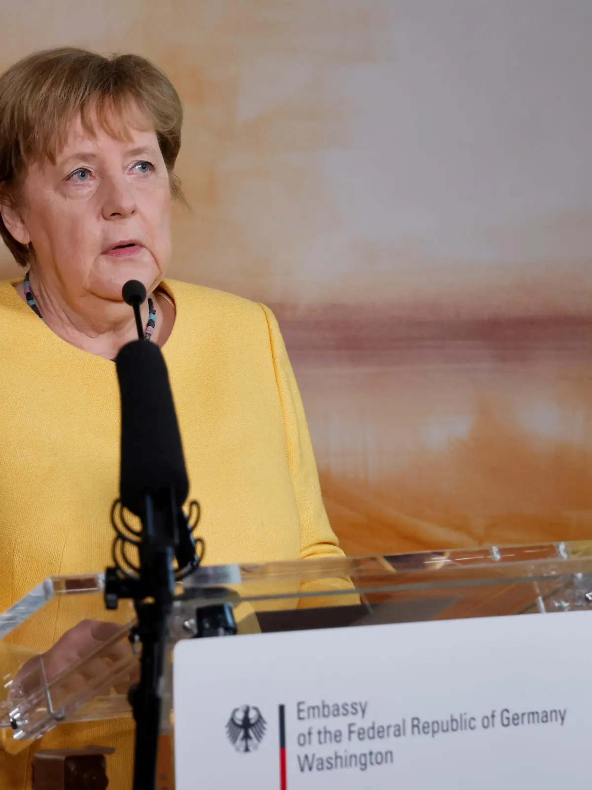 German Chancellor Angela Merkel delivers a statement at the German ambassador's residence in Washington, U.S., July 15, 2021. REUTERS/Jonathan Ernst