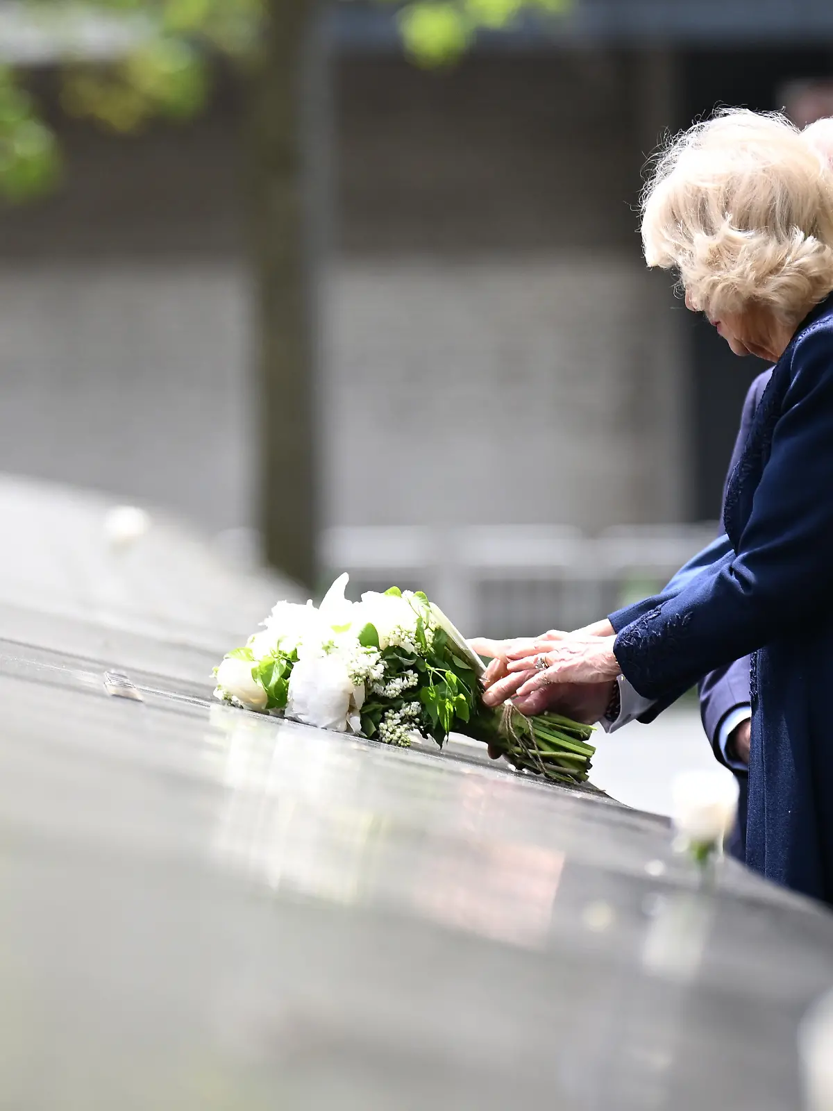 State visit to the US - Day Three. Michael Bloomberg, King Charles III and Queen Camilla are seen after laying a bouquet of flowers on the edge of one of the memorial???s pools during a visit to the 9/11 Memorial and Museum in New York, on day three of the state visit to the US. Picture date: Wednesday April 29, 2026. Photo credit should read: Samir Hussein/PA Wire URN:84455515