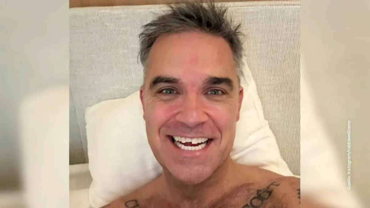Robbie Williams überrascht mit neuem Look – „Reparatur oder Rebranding?” Knacks! Der halbe Zahn ist ab!