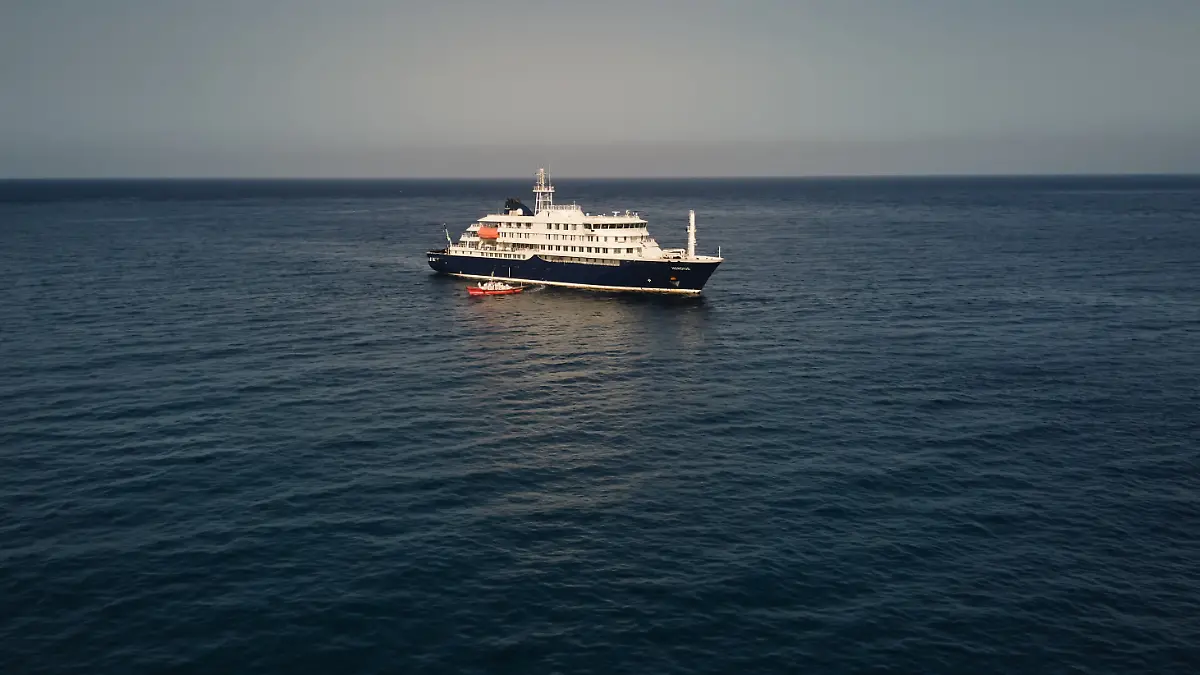 An aerial view of the MV Hondius Dutch cruise ship anchored in the Atlantic off Cape Verde, Tuesday, May 5, 2026. (AP Photo/Arilson Almeida)