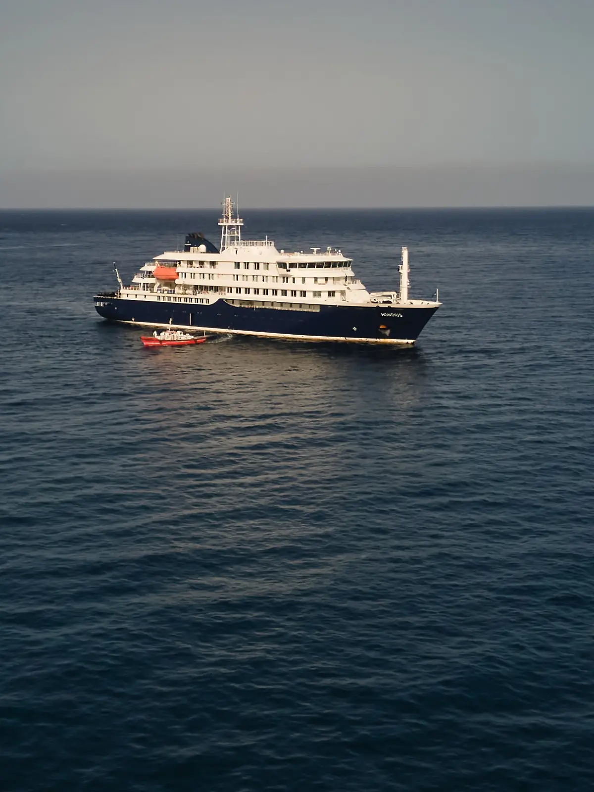 An aerial view of the MV Hondius Dutch cruise ship anchored in the Atlantic off Cape Verde, Tuesday, May 5, 2026. (AP Photo/Arilson Almeida)