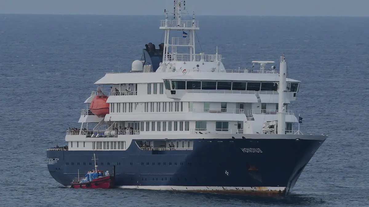 The MV Hondius cruise ship is anchored at a port in Praia, Cape Verde, Wednesday, May 6, 2026. (AP Photo/Misper Apawu)