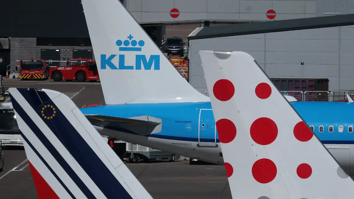 The tails of Air France, KLM and Brussels Airlines planes on the tarmac at Manchester Airport in Manchester