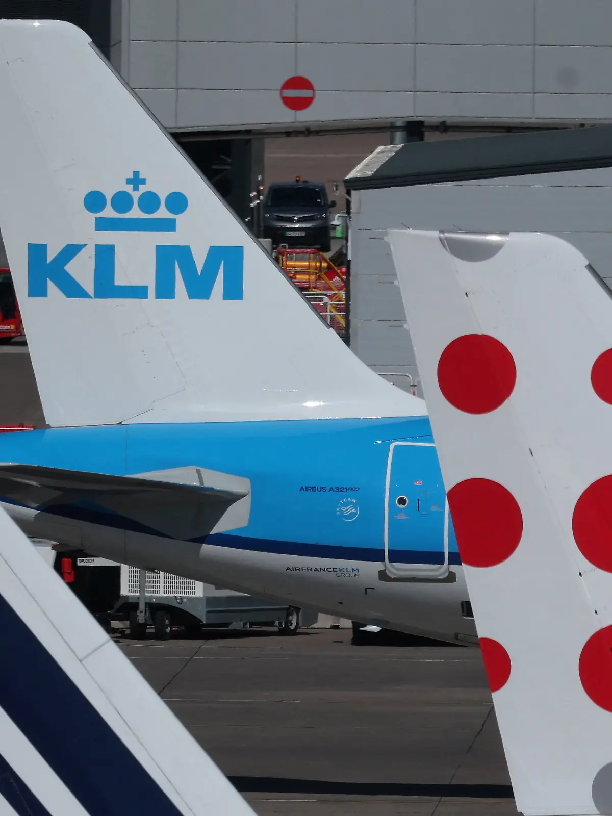 The tails of Air France, KLM and Brussels Airlines planes on the tarmac at Manchester Airport in Manchester