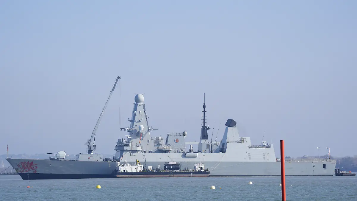 US and Israeli attacks on Iran. Royal Navy Type 45 destroyer HMS Dragon at the Upper Harbour Ammunition Facility (UHAF) in Portsmouth harbour, Hampshire, ahead of being deployed to protect British military personnel in Cyprus. Picture date: Wednesday March 4, 2026. The UK will send helicopters with counter-drone capabilities and HMS Dragon, one of the Royal Navy's six Type 45 air defence destroyers, after RAF Akrotiri on Cyprus was hit by a drone. Photo credit should read: Andrew Matthews/PA Wire URN:83730545