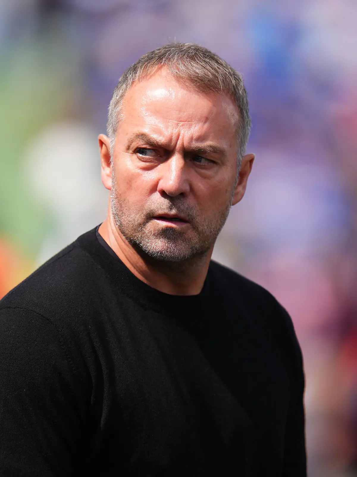 Barcelona's head coach Hansi Flick enters to the pitch prior to the Spanish La Liga soccer match between Getafe and Barcelona in Getafe, Spain, Saturday, April 25, 2026. (AP Photo/Manu Fernandez)