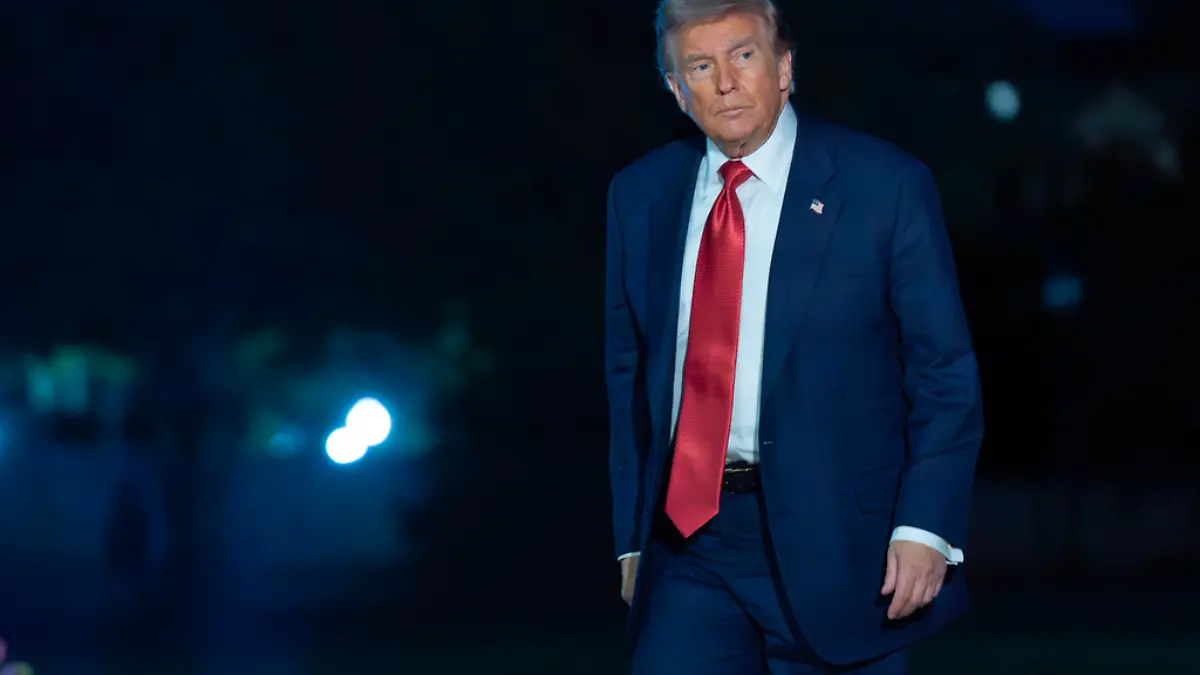 President Donald Trump walks on the South Lawn upon his arrival to the White House, Friday, May 8, 2026, in Washington. (AP Photo/Jose Luis Magana)