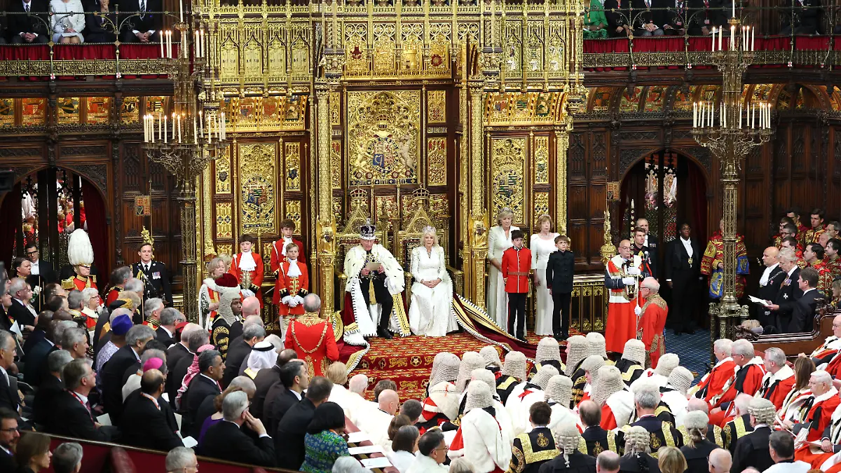 State Opening of Parliament. King Charles III, wearing the Imperial State Crown and the Robe of State, alongside Queen Camilla, wearing the George IV State Diadem and an embroidered gown by Fiona Clare, in the Chamber of the House of Lords during the State Opening of Parliament at the Palace of Westminster in London. Picture date: Wednesday May 13, 2026. Photo credit should read: Chris Jackson/PA Wire URN:84600320