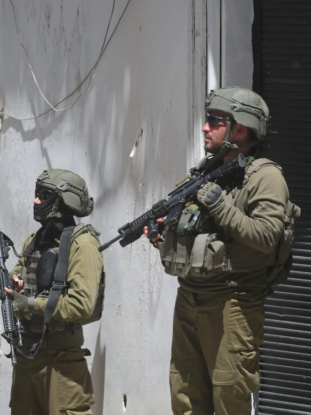 Israeli soldiers stand on a street during an Israeli army raid in the northern West Bank city of Nablus, in Nablus, West Bank, Palestine on April 23, 2026. Photo by Mohammed Nasser apaimages//APAIMAGES_230426_Nablus_MN_00(7)/Credit:Mohammed Nasser apaimag/SIPA/2604231540