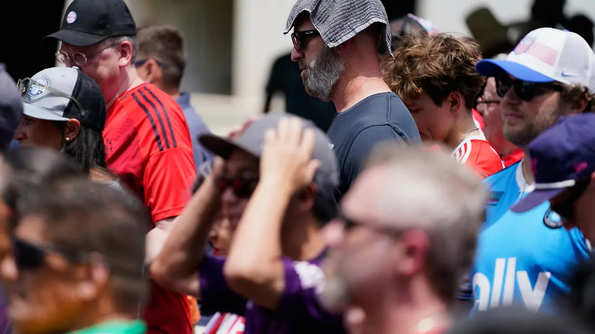 FILE - Soccer fans wait in line to enter Bank of America Stadium for a Club World Cup game, June 24, 2025, in Charlotte, N.C. (AP Photo/Erik Verduzco, File)