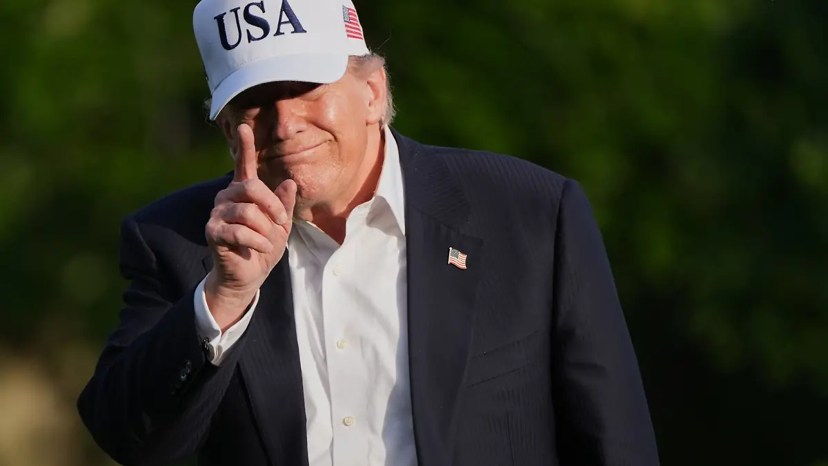 President Donald Trump walks across the South Lawn of the White House, Friday, May 15, 2026, in Washington, on return from Beijing where he met with China's President Xi Jinping. (AP Photo/Jacquelyn Martin)