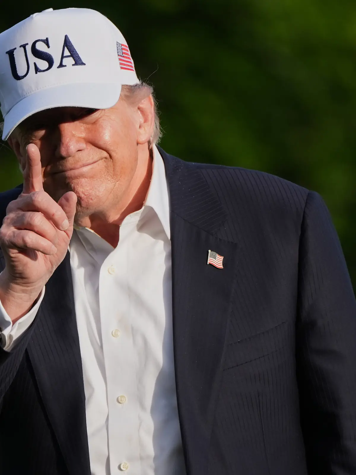 President Donald Trump walks across the South Lawn of the White House, Friday, May 15, 2026, in Washington, on return from Beijing where he met with China's President Xi Jinping. (AP Photo/Jacquelyn Martin)