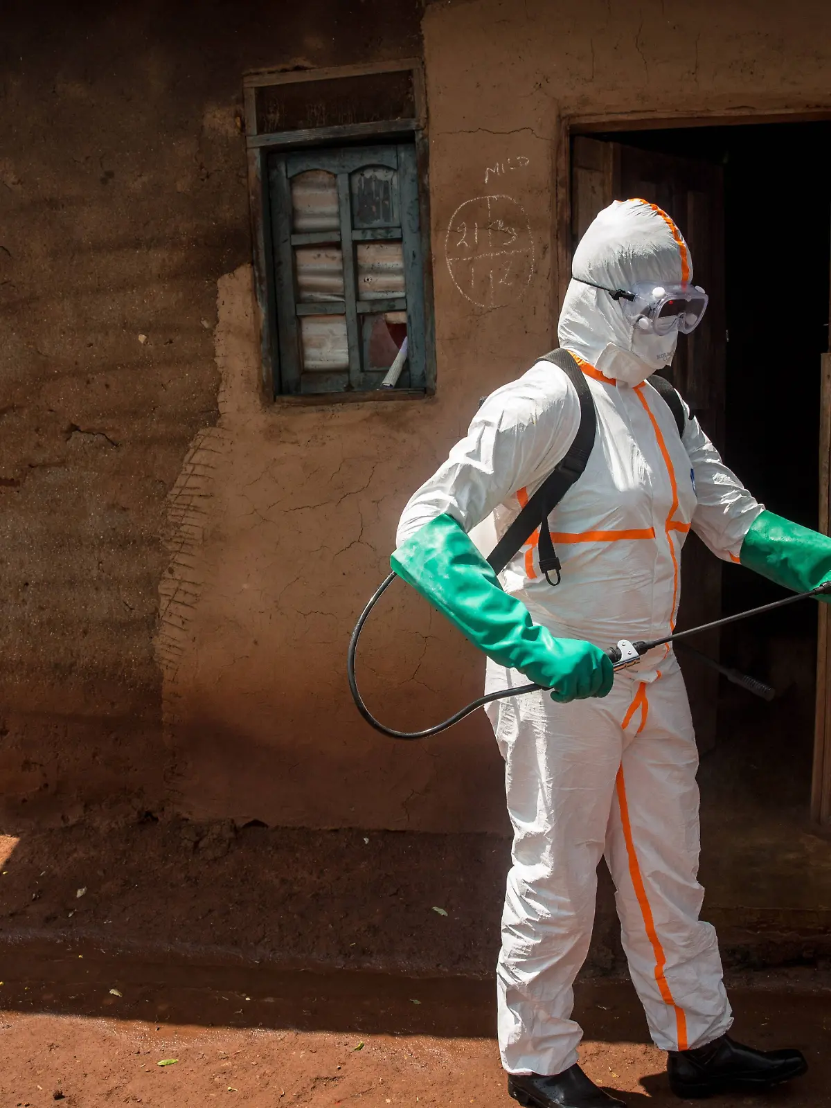 June 13, 2019 - Beni, Democratic Republic of Congo - World Health Organization worker Belinda Landu, 28, decontaminates the house of a pastor who has just tested positive for Ebola in Beni..The DRC is currently experiencing the second largest Ebola outbreak in recorded history, and the response is hampered by it being in an active conflict zone. More than 1,400 people have died since August 2018. Beni Democratic Republic of Congo PUBLICATIONxINxGERxSUIxAUTxONLY - ZUMAs197 20190613_zab_s197_051 Copyright: xSallyxHaydenx  
