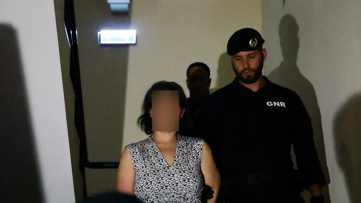 Frenchwoman Marine R. (L) leaves the Setubal courthouse, suspected of abandoning two children, in Setubal,