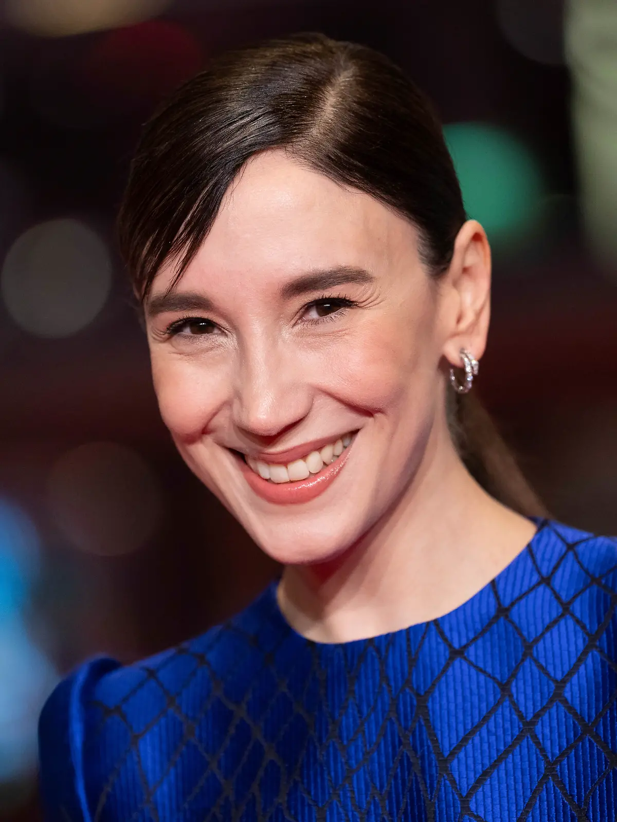 Sibel Kekilli poses for photographers upon arrival on the red carpet for the film 'Yunan' during the International Film Festival, Berlinale, in Berlin, Wednesday, Feb. 19, 2025. (Photo by Scott A Garfitt/Invision/AP).