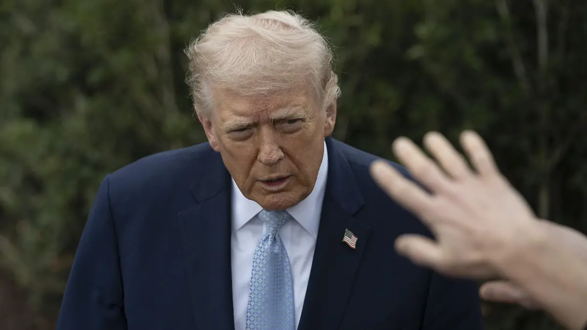 WASHINGTON DC, UNITED STATES - MARCH 20: United States President Donald Trump speaks to the press before his departs the White House en route Miami, Florida on March 20, 2026, in Washington DC. Celal Gunes / Anadolu