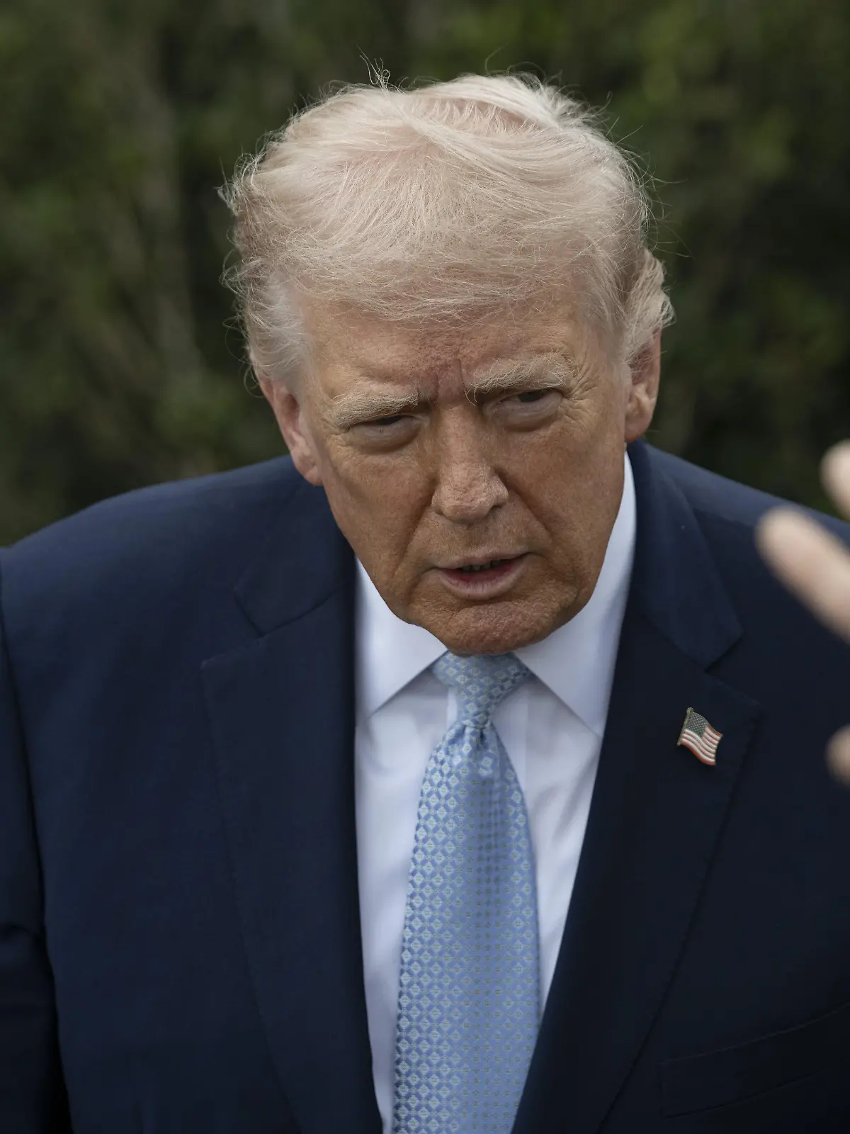 WASHINGTON DC, UNITED STATES - MARCH 20: United States President Donald Trump speaks to the press before his departs the White House en route Miami, Florida on March 20, 2026, in Washington DC. Celal Gunes / Anadolu
