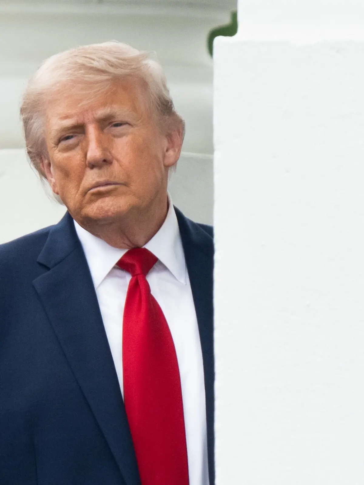 United States President Donald J Trump inspects the columns of the North Portico of the White House in Washington DC on Monday, May 25, 2025. Credit: CNP / AdMedia