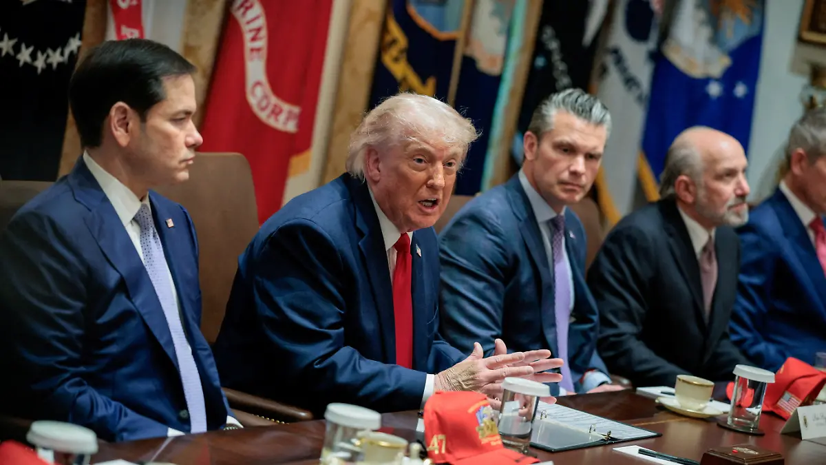 U.S. President Donald Trump speaks next to Secretary of State Marco Rubio, Defense Secretary Pete Hegseth and Commerce Secretary Howard Lutnick during a cabinet meeting in the Cabinet Room at the White House, in Washington, D.C., U.S., May 27, 2026. REUTERS/Evan Vucci