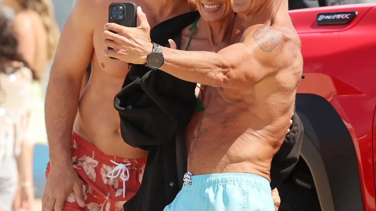 Venice Beach, CA Original Baywatch stars David Chokachi, Kelly Packard, and Michael Bergin turned back the clock in Venice Beach, showing off their toned physiques while filming scenes for the highly anticipated new Baywatch revival. The iconic lifeguard trio looked right at home on the sand as cameras rolled for the reboot of the classic beach drama.
Pictured: David Chokachi, Kelly Packard, Michael Bergin
BACKGRID USA 27 MAY 2026