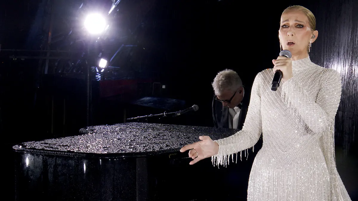 Paris 2024 Olympics - Opening Ceremony - Paris, France - July 26, 2024. Canadian Singer Celine Dion performs at the Eiffel Tower at the conclusion of the opening ceremony of the Olympic Games Paris 2024 on July 26, 2024 in Paris, France. OLYMPIC BROADCASTING SERVICES/Pool via REUTERS