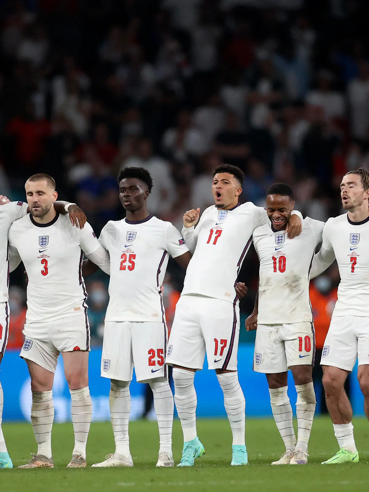 England players react during a penalty shootout at the end of the Euro 2020 soccer championship final match between England and Italy at Wembley stadium in London, Sunday, July 11, 2021. Italy defeated England 3-2 in a penalty shootout after the game ended in a 1-1 draw. (Carl Recine/Pool Photo via AP)
