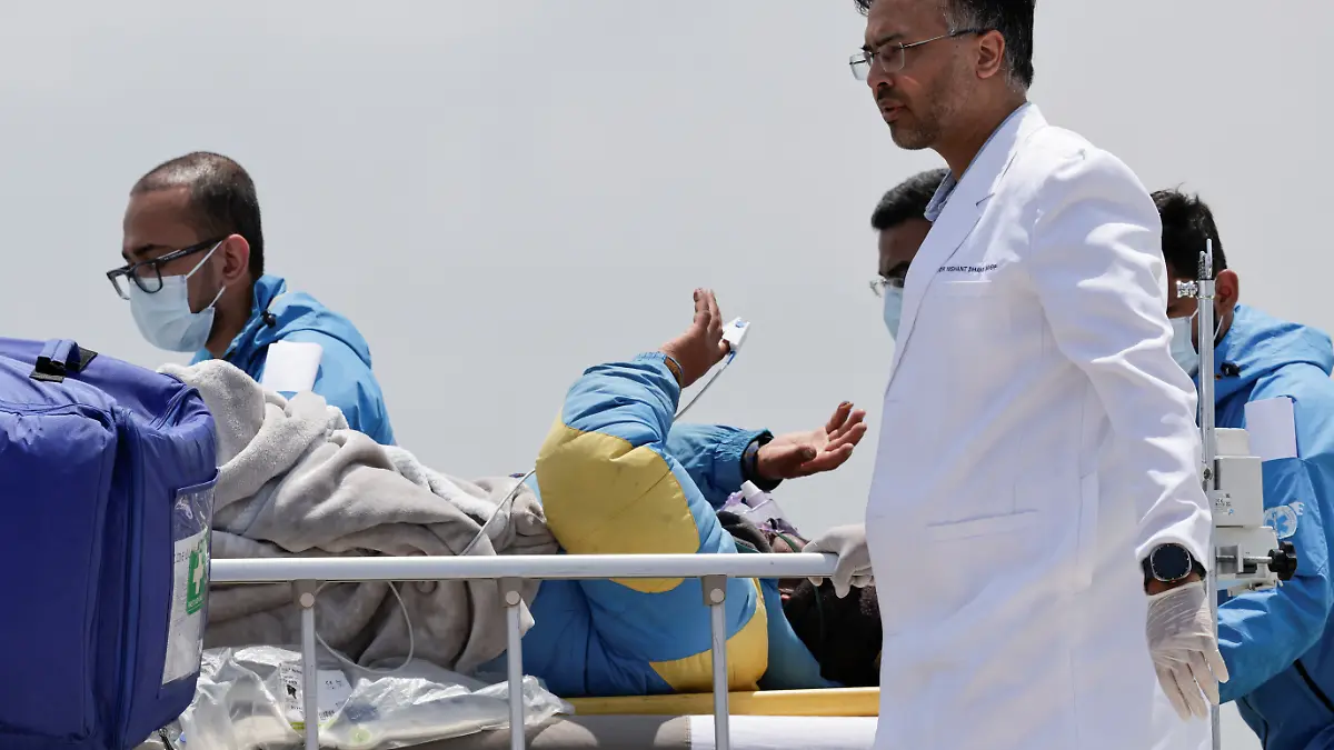Paramedics transport Dawa Sherpa, who was missing for several days in the Everest region, from the helipad at HAMS Hospital in Kathmandu, Nepal, June 4, 2026. REUTERS/Navesh Chitrakar