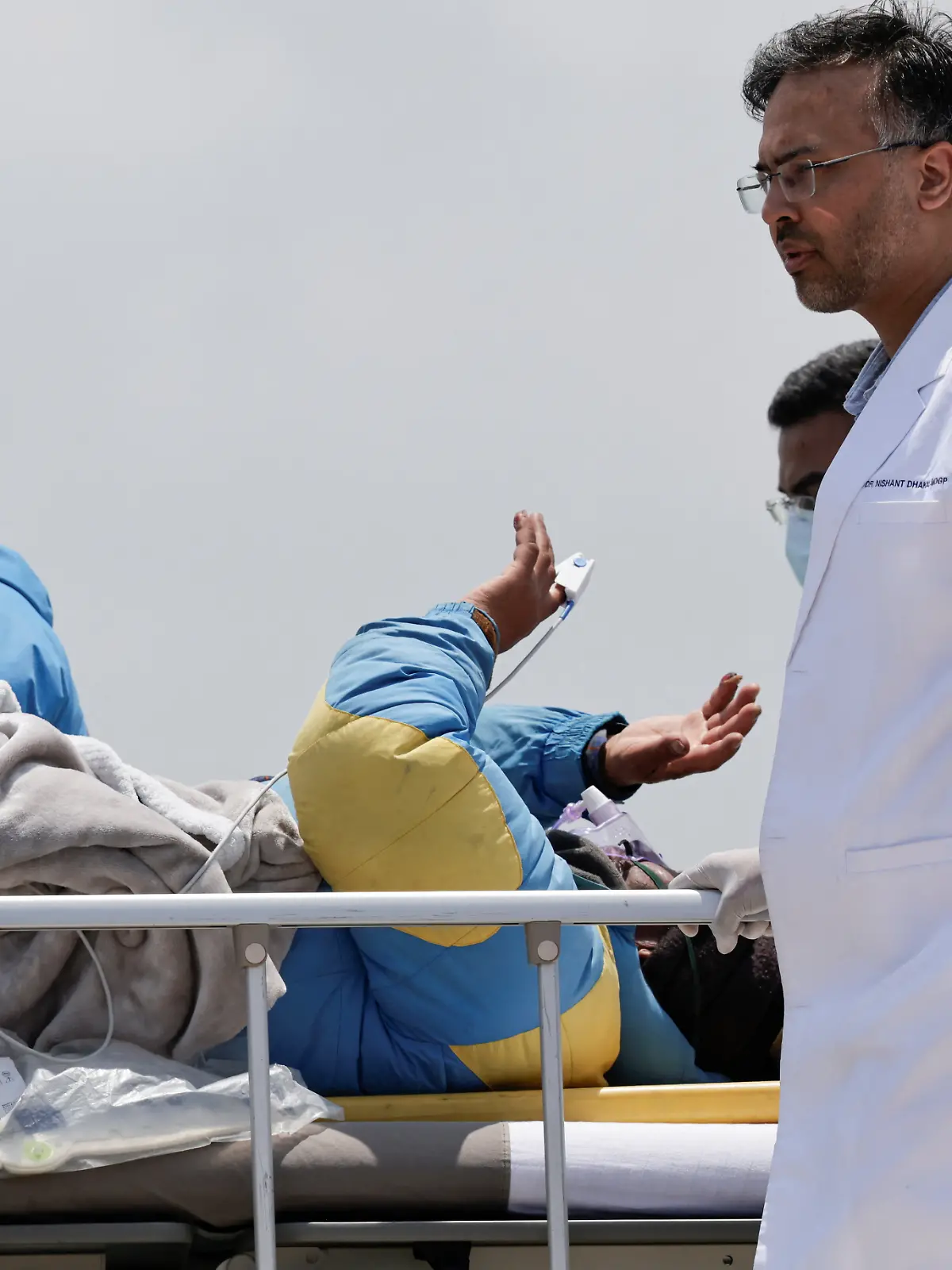 Paramedics transport Dawa Sherpa, who was missing for several days in the Everest region, from the helipad at HAMS Hospital in Kathmandu, Nepal, June 4, 2026. REUTERS/Navesh Chitrakar