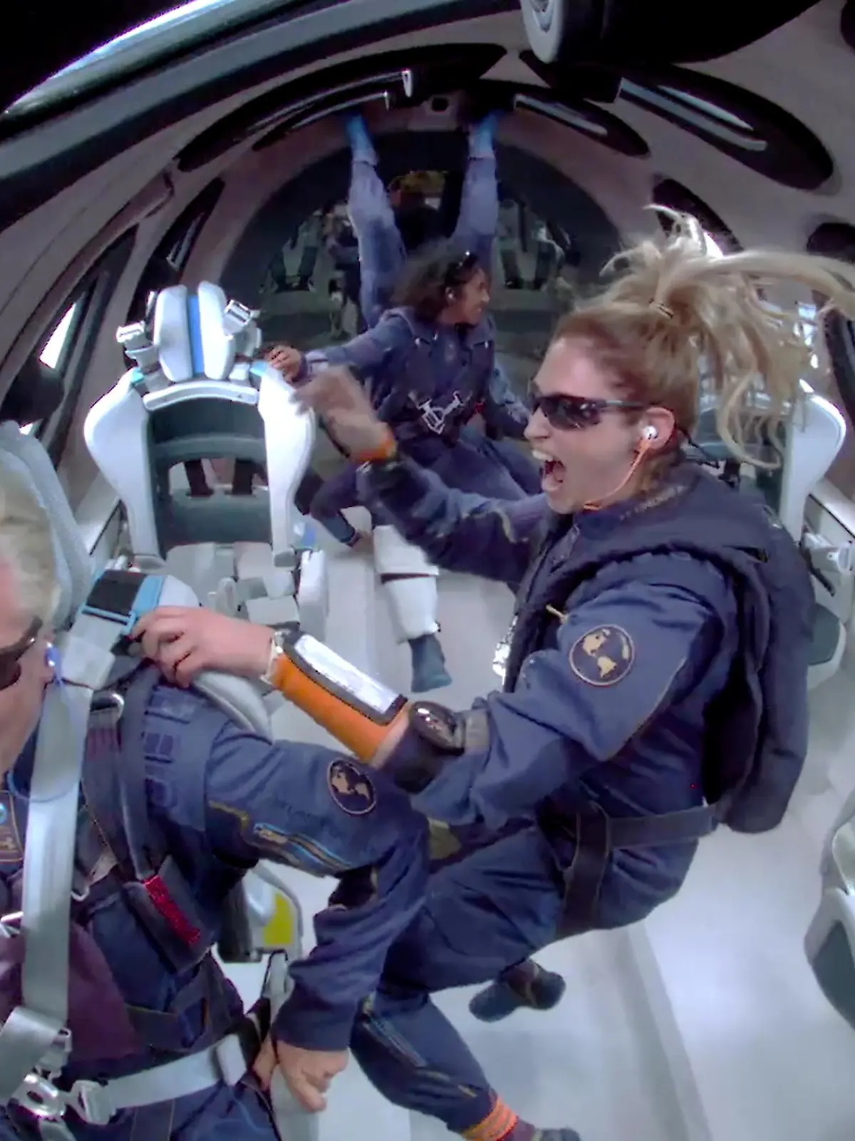 Billionaire Richard Branson makes a statement as crew members Beth Moses and Sirisha Bandla float in zero gravity on board Virgin Galactic's passenger rocket plane VSS Unity after reaching the edge of space above Spaceport America near Truth or Consequences, New Mexico, U.S. July 11, 2021 in a still image from video.    Virgin Galactic/Handout via REUTERS.  NO RESALES. NO ARCHIVES. THIS IMAGE HAS BEEN SUPPLIED BY A THIRD PARTY.