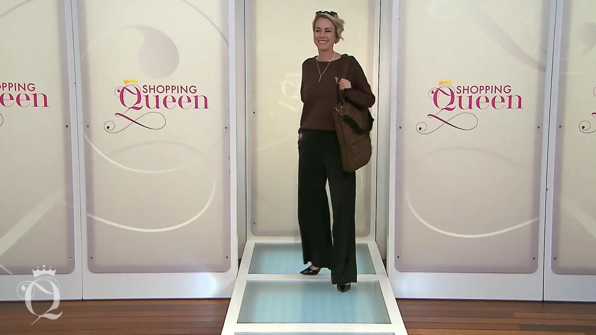 „Shopping Queen“-Kandidatin Rita in ihrem dunklen Business-Look