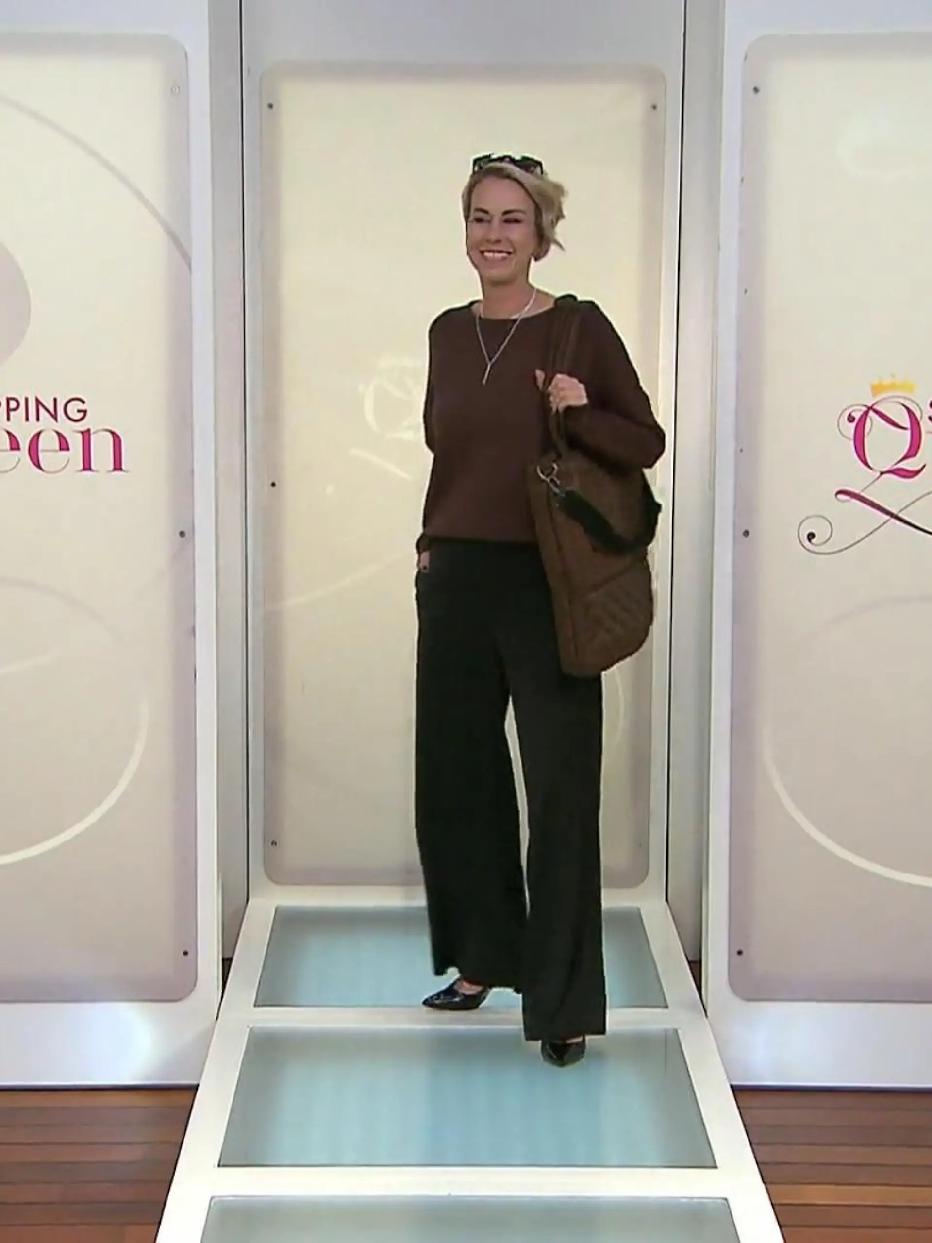 „Shopping Queen“-Kandidatin Rita in ihrem dunklen Business-Look