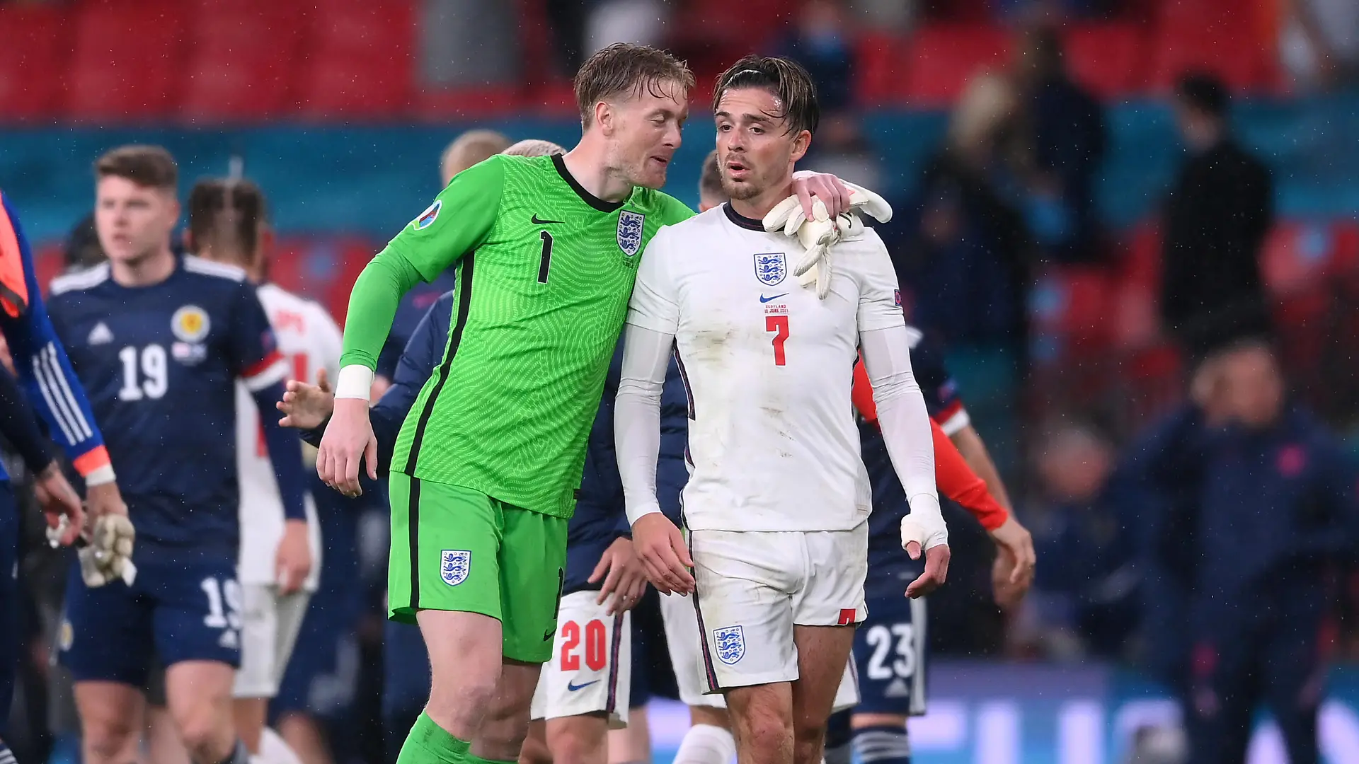 LONDON, ENGLAND - JUNE 18: Jordan Pickford of England interacts with team mate Jack Grealish after the UEFA Euro 2020 Championship Group D match between England and Scotland at Wembley Stadium on June 18, 2021 in London, England. (Photo by Laurence Griffiths/Getty Images)