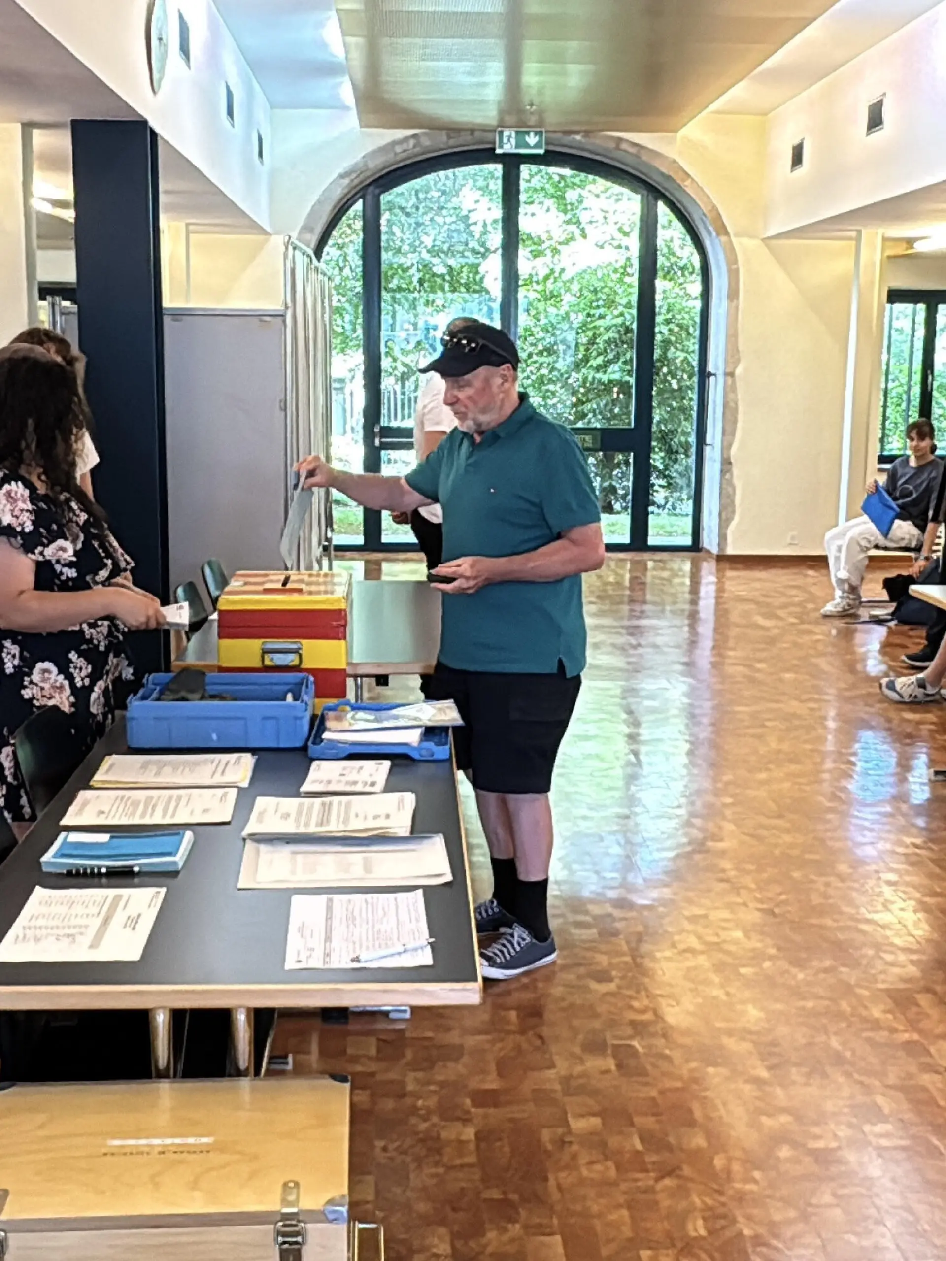 GENEVA, SWITZERLAND - JUNE 14: A voter casts a ballot at a polling station during a referendum on a proposal to limit Switzerland's population to 10 million people in Bern, Switzerland, on June 14, 2026. Voters headed to the polls to decide on the 'No to a Switzerland of 10 Million' initiative backed by the right-wing Swiss People's Party (SVP). Muhammet Ikbal Arslan / Anadolu