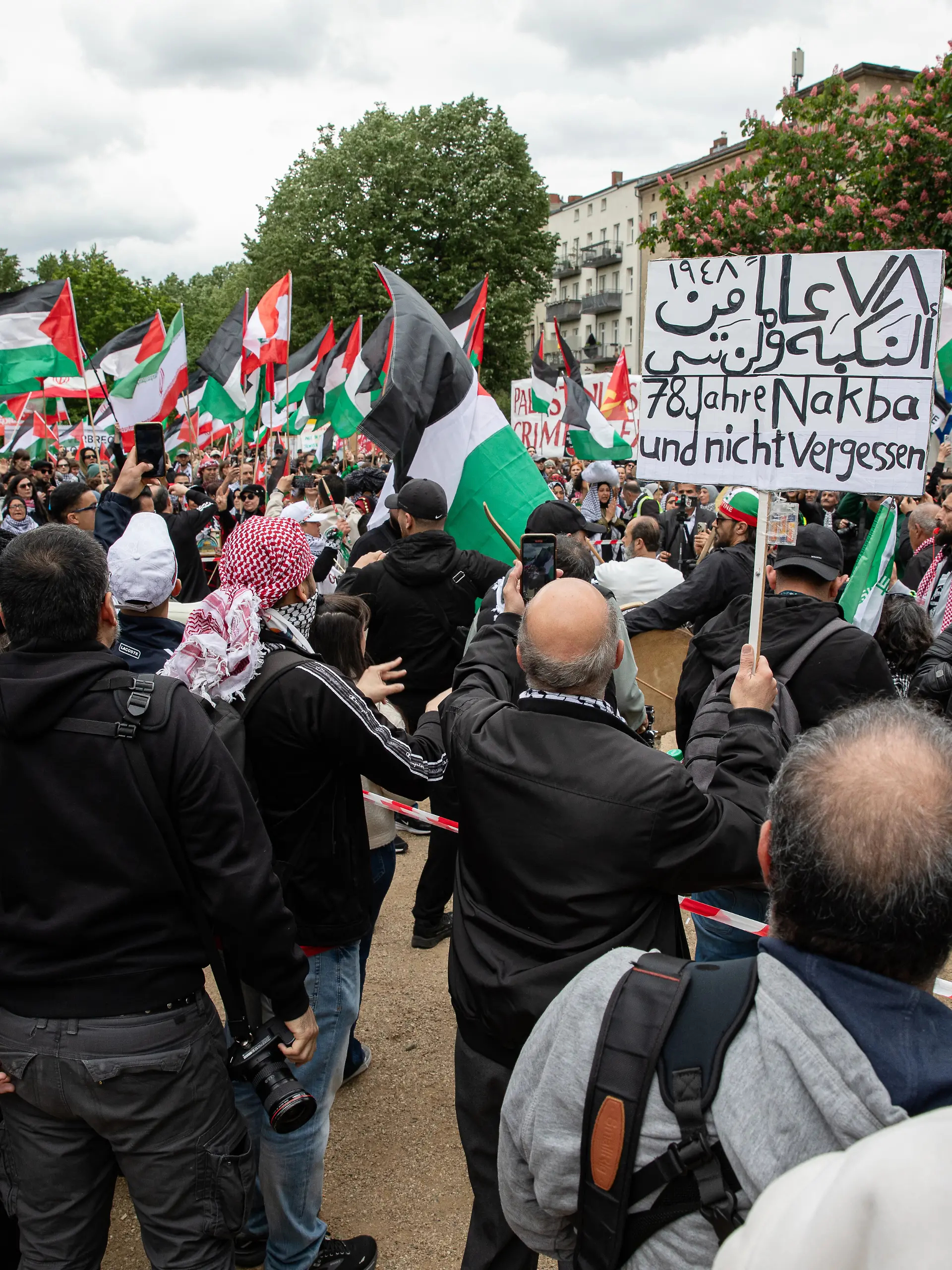 May 16, 2026, Berlin, Berlin, Germany: Police officers detain demonstrators during a Nakba Day protest in Berlin-Kreuzberg, Germany, on May 16, 2026. Around 2,000 people joined the march from Oranienplatz to Suedstern as tensions flared between protesters and police, leading to multiple arrests, according to authorities. Berlin police said 14 people were detained over alleged offenses, including attacks on officers and the use of symbols linked to unconstitutional organizations. The demonstration was monitored by around 700 police officers following violent clashes at similar protests in previous years. (Credit Image: © Michael Kuenne/PRESSCOV via ZUMA Press Wire