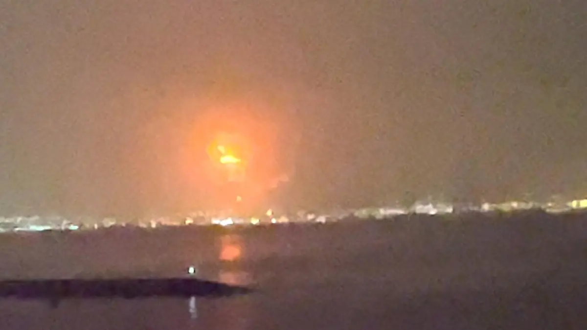 Fire caused by an explosion is seen at Dubai's Jebel Ali Port in Dubai, United Arab Emirates, July 7, 2021, in this still image taken from video obtained from social media. Video taken July 7, 2021. Mandatory credit ALDA FEBRIAN MARPAUNG/via REUTERS ATTENTION EDITORS - THIS IMAGE HAS BEEN SUPPLIED BY A THIRD PARTY. MANDATORY CREDIT. NO RESALES. NO ARCHIVES.