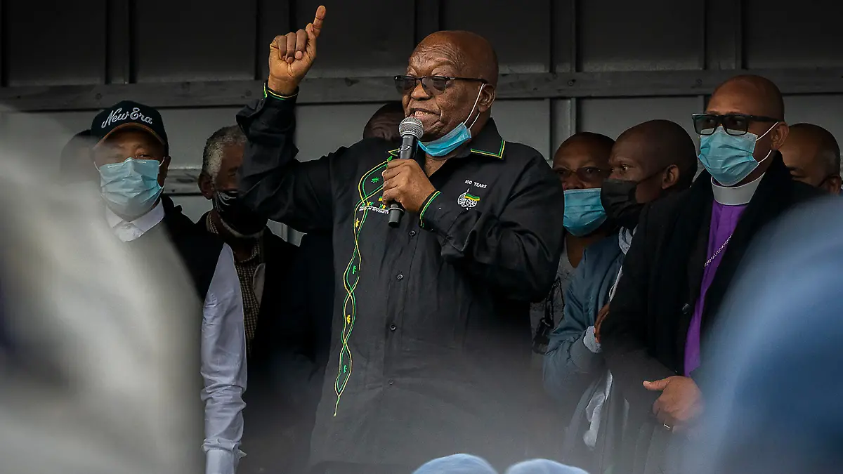 Former president Jacob Zuma addresses his supporters at his home in Nkandla, KwaZulu-Natal Natal Province, Sunday, July 4, 2021. The Constitutional Court will hear Zuma's urgent application on July 12 to rescind its order sentencing him to jail for 15 months for contempt of court. Zuma was initially supposed to hand himself over to authorities for his incarceration by Sunday. (AP Photo/Shiraaz Mohamed)