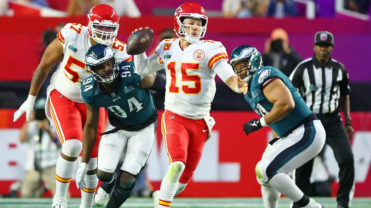 Feb 12, 2023; Glendale, Arizona, US; Kansas City Chiefs quarterback Patrick Mahomes (15) passes the ball against the Philadelphia Eagles during the second quarter of Super Bowl LVII at State Farm Stadium. Mandatory Credit: Mark J. Rebilas-USA TODAY Sports