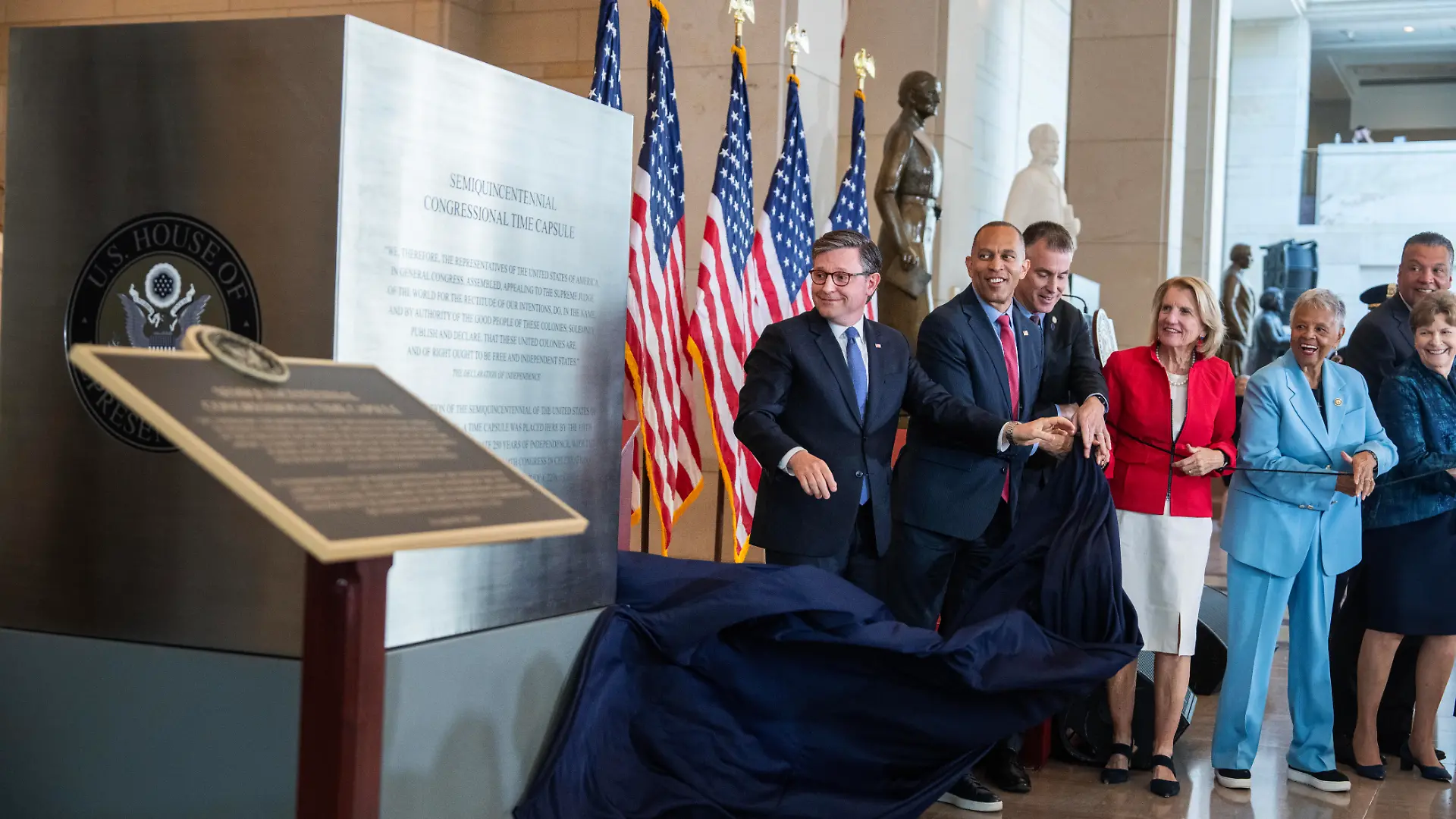 UNITED STATES - JUNE 24: From left, Speaker of the House Mike Johnson, R-La., House Minority Leader Hakeem Jeffries, D-N.Y., Architect of the Capitol Thomas E. Austin, Sen. Shelley Moore Capito, R-W.Va., Rep. Bonnie Watson Coleman, D-N.J., Sens. Jeanne Shaheen, D-N.H., and Alex Padilla, D-Calif., unveil the Semiquincentennial Congressional Time Capsule during a ceremony in Emancipation Hall on Wednesday, June 24, 2026. The capsule will be sealed for 250 years until July 4, 2276. (Tom Williams/CQ Roll Call/Sipa USA)