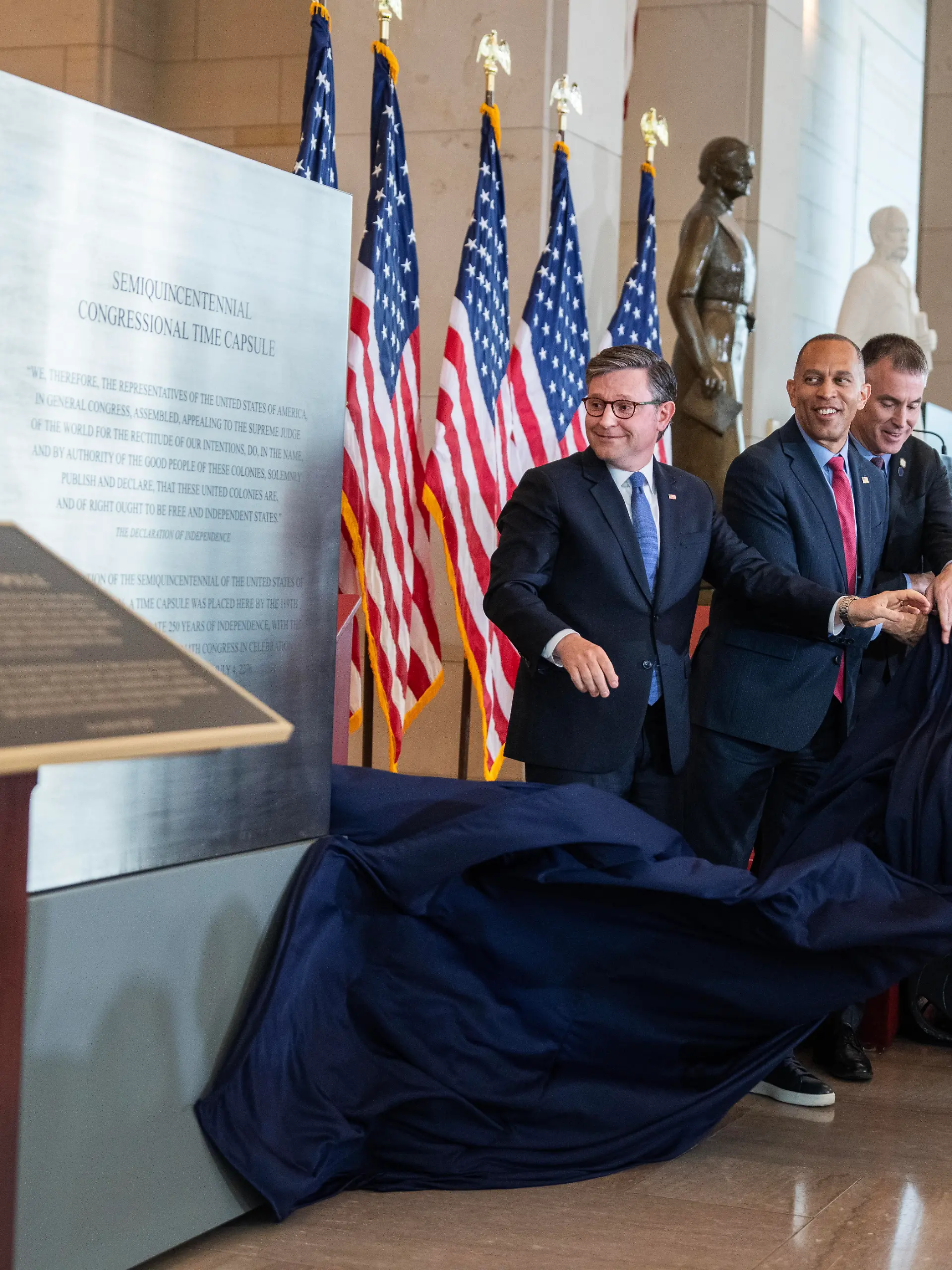 UNITED STATES - JUNE 24: From left, Speaker of the House Mike Johnson, R-La., House Minority Leader Hakeem Jeffries, D-N.Y., Architect of the Capitol Thomas E. Austin, Sen. Shelley Moore Capito, R-W.Va., Rep. Bonnie Watson Coleman, D-N.J., Sens. Jeanne Shaheen, D-N.H., and Alex Padilla, D-Calif., unveil the Semiquincentennial Congressional Time Capsule during a ceremony in Emancipation Hall on Wednesday, June 24, 2026. The capsule will be sealed for 250 years until July 4, 2276. (Tom Williams/CQ Roll Call/Sipa USA)