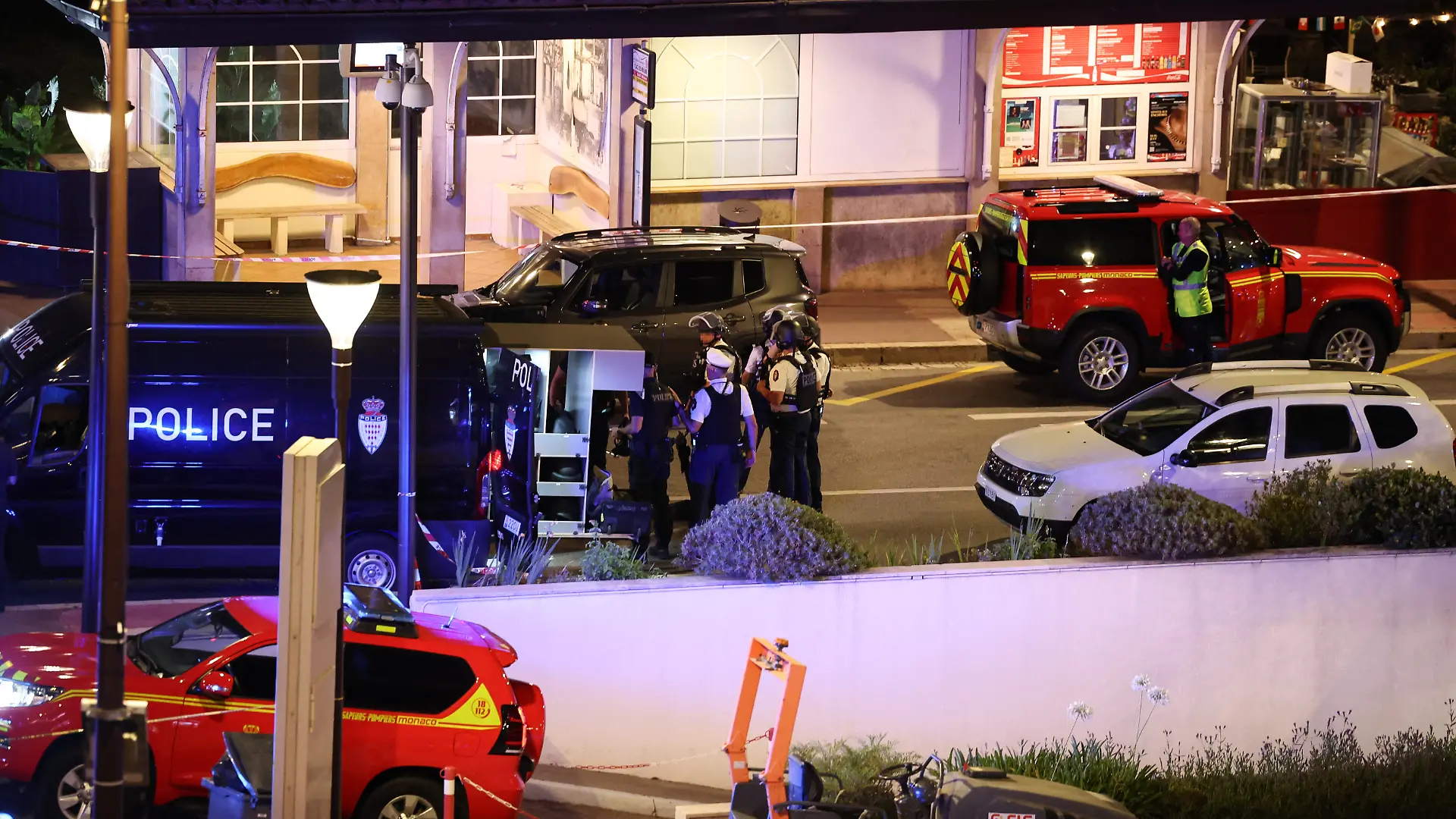 This photograph shows Monaco's emergency services deployed near the area of an explosion that occurred in a residential building in Monaco, near the border with France on June 29, 2026. Three people were injured  two of them very seriously  in the explosion of an explosive device in Monaco in the evening. The blast at a residential building was "very likely an attack", Monaco's Minister of State (head of government) told AFP. Public prosecutor said a suspect had left a bag or package in the building's lobby before leaving. Nothing appeared for the moment to indicate why the building might have been targeted, he said. (Photo by Valery HACHE / AFP)