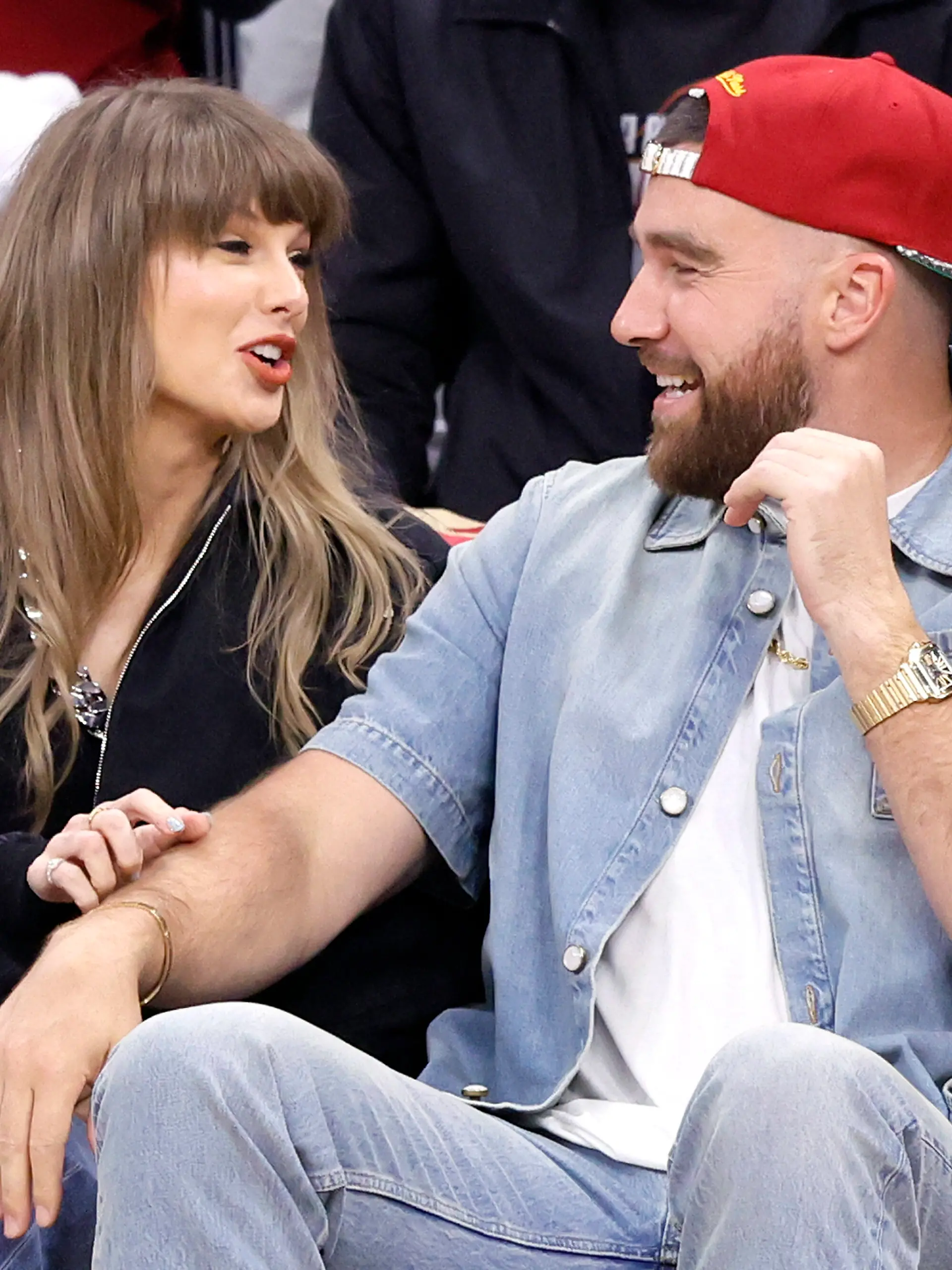 Taylor Swift and Travis Kelce talkd during the first quarter of the Cleveland Cavaliers Eastern Conference Final game against the New York Knicks in Cleveland, Ohio Saturday May 23, 2026. Photo by Aaron Josefczyk Photo via Newscom picture alliance