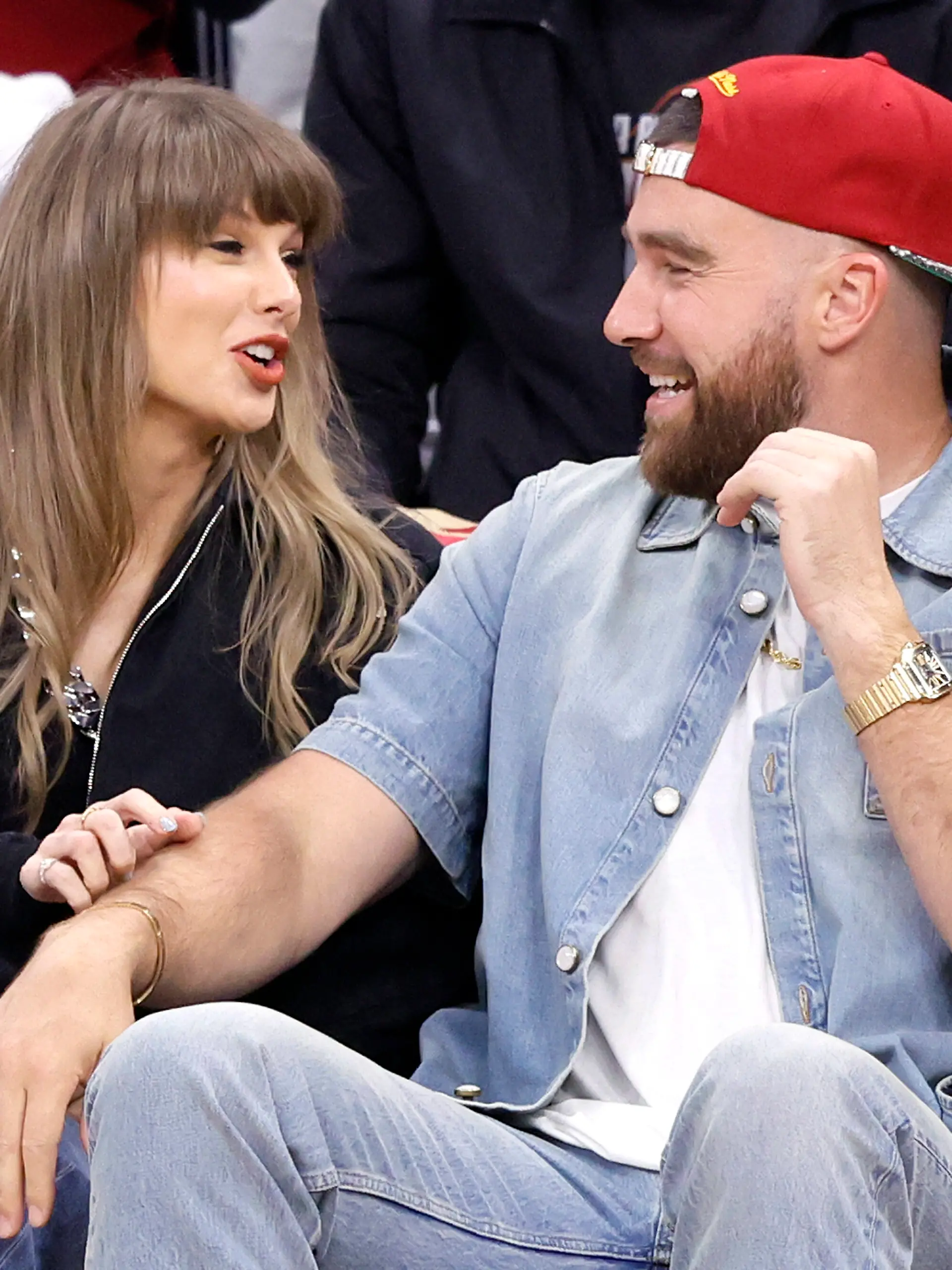 Taylor Swift and Travis Kelce talkd during the first quarter of the Cleveland Cavaliers Eastern Conference Final game against the New York Knicks in Cleveland, Ohio Saturday May 23, 2026. Photo by Aaron Josefczyk Photo via Newscom picture alliance