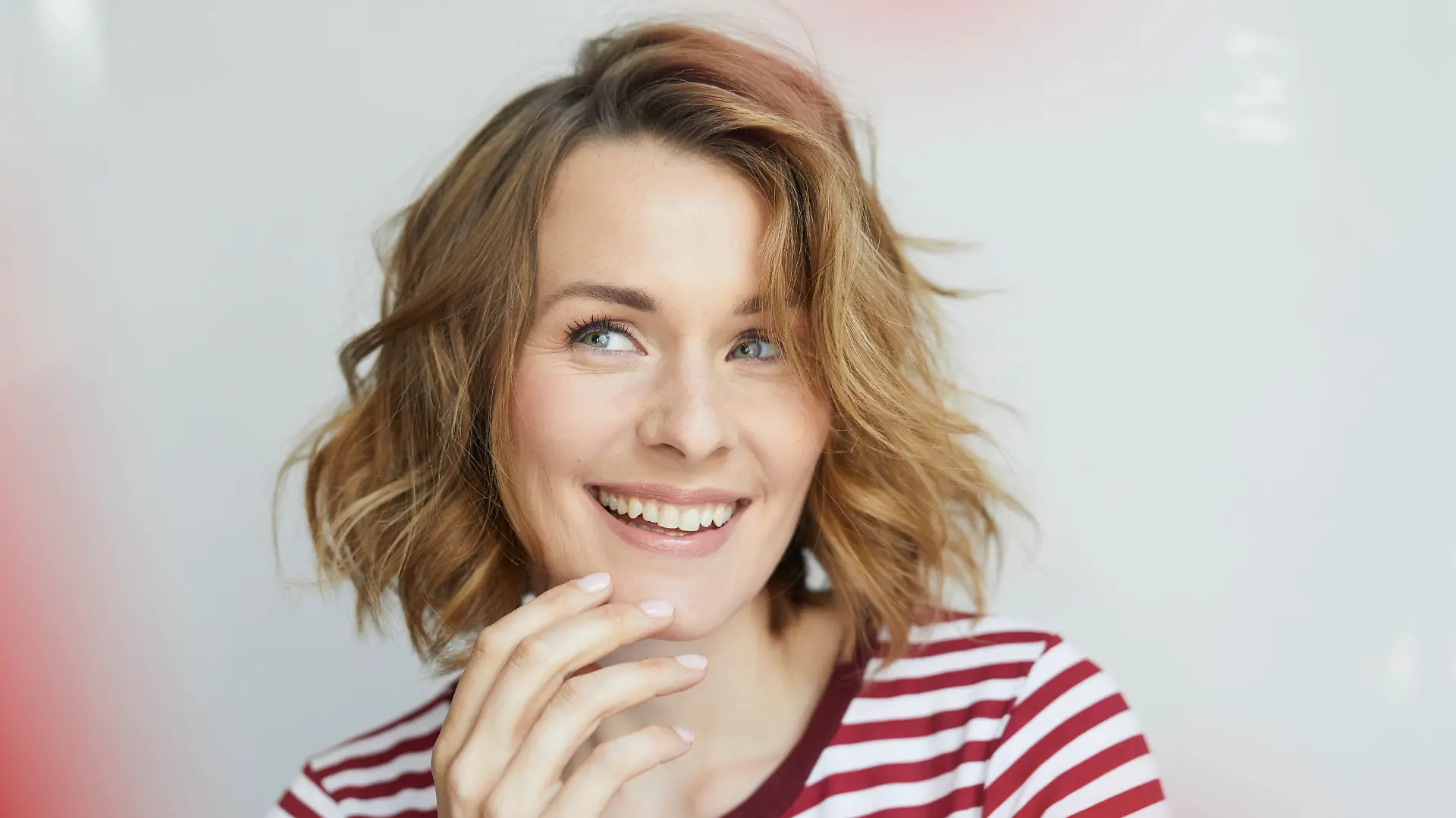 Frau mit voluminösem Bob.