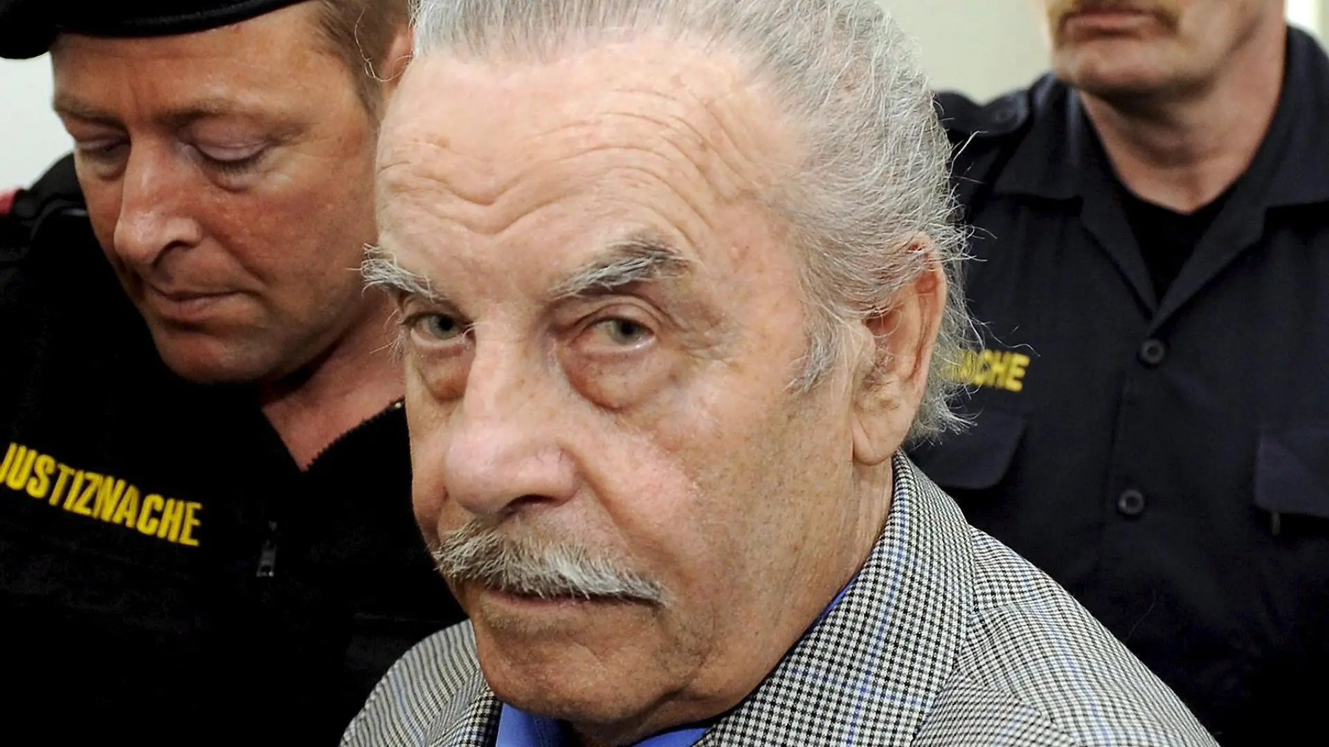 Defendant Josef F. (C), prior to the start of the fourth day of his trial for incest on 19 March 2009, at the provincial courthouse in St. Poelten. Josef F., the Austrian father on trial for imprisoning and raping his daughter Elisabeth for 24 years in the cellar of his home, pleaded guilty to murder 18 March 2009. An Austrian prosecutor is urging a jury to hand down a life sentence to Josef F., who imprisoned his daughter in a windowless cell for 24 years and fathered her seven children. Prosecutor Christiane Burkheiser called for the maximum punishment in her closing arguments in Josef F.'s trial in St. Poelten. COURT IMPOSED RESTRICTIONS APPLY: These photographs are being licensed free of charge for editorial use by media representatives covering the ongoing criminal trial. All other uses, including resale of the photographs, are strictly prohibited. The user takes sole responsibility for protecting the image and identity rights of those pictured, by pixellation or other means. EPA/ROBERT JAEGER / POOL NO SALES - EDITORIAL USE ONLY +++(c) dpa - Bildfunk+++