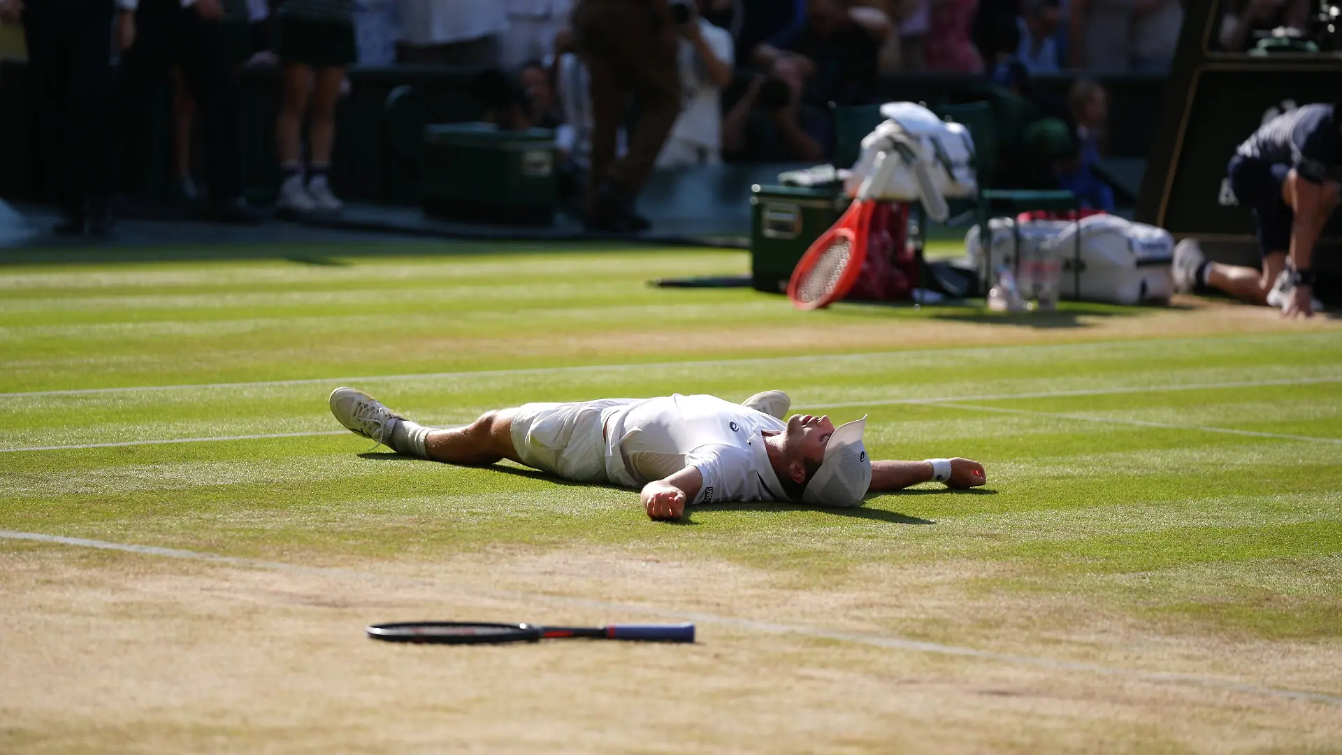 Arthur Fery of Britain reacts to winning against Flavio Cobolli of Italy in their quarter-final men's singles match at the Wimbledon Tennis Championships in London, Wednesday, July 8, 2026. (AP Photo/Maja Smiejtowska)