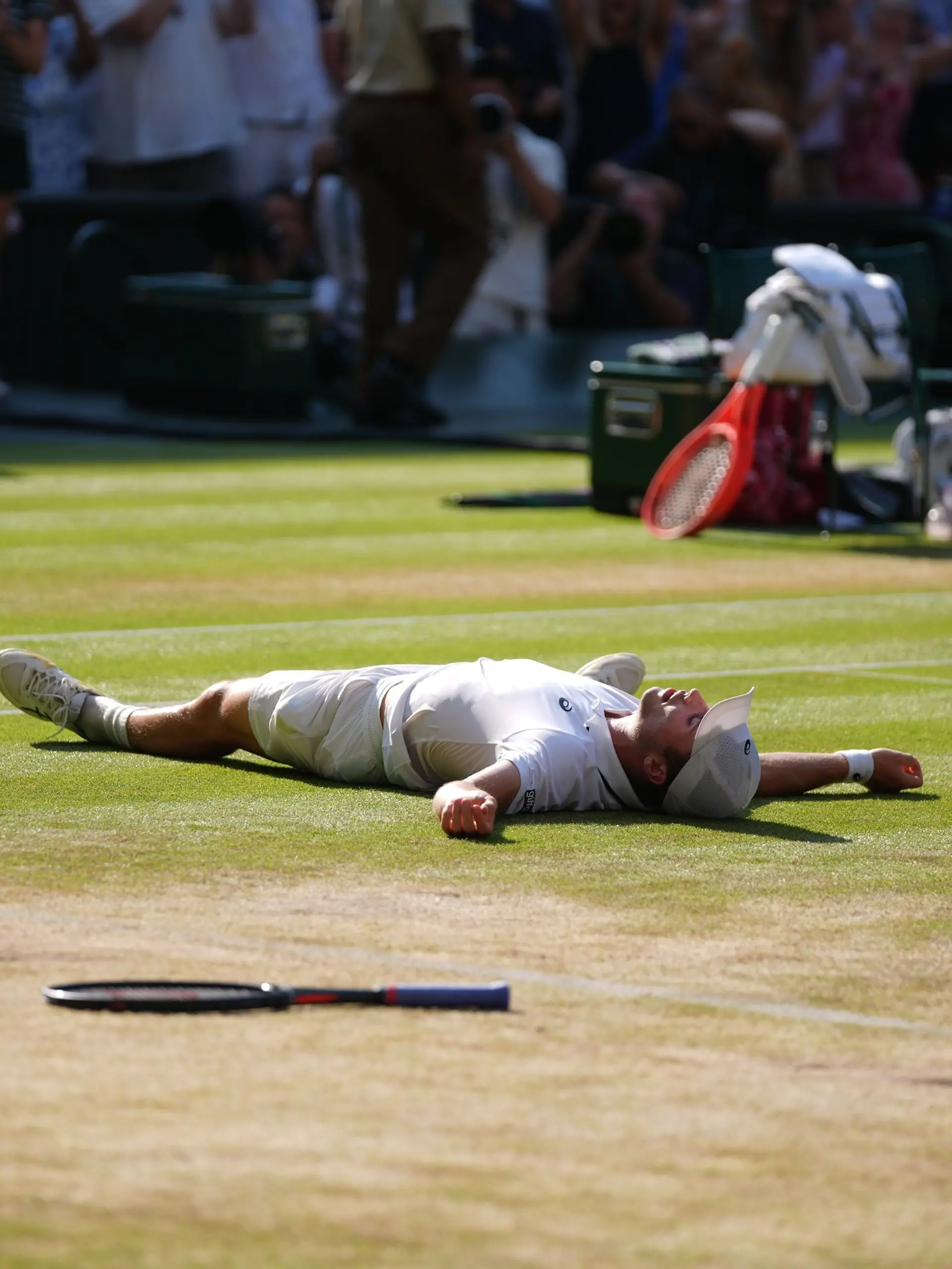 Arthur Fery of Britain reacts to winning against Flavio Cobolli of Italy in their quarter-final men's singles match at the Wimbledon Tennis Championships in London, Wednesday, July 8, 2026. (AP Photo/Maja Smiejtowska)