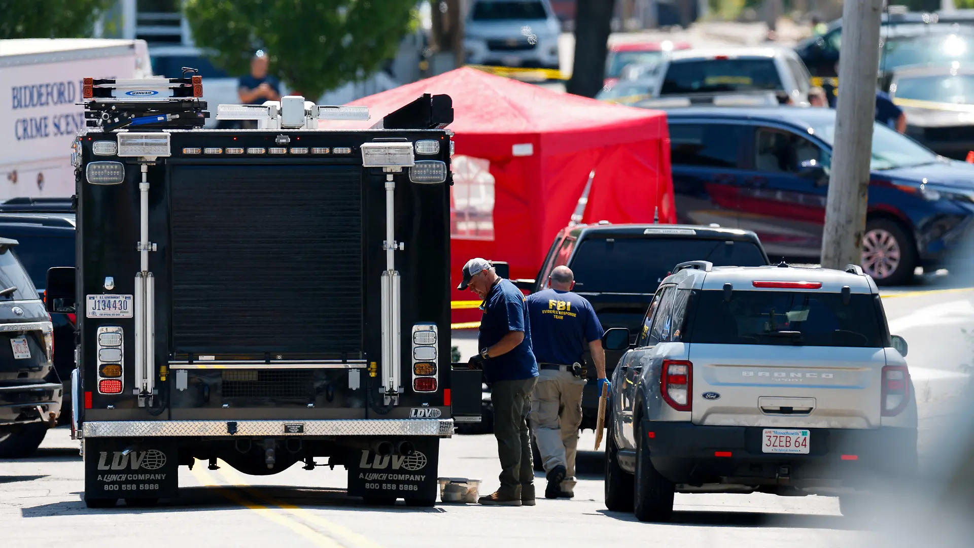 FBI agents work at a scene of a shooting involving U.S. Immigration and Customs Enforcement (ICE) in Biddeford, Maine, U.S. July 13, 2026. REUTERS/CJ Gunther