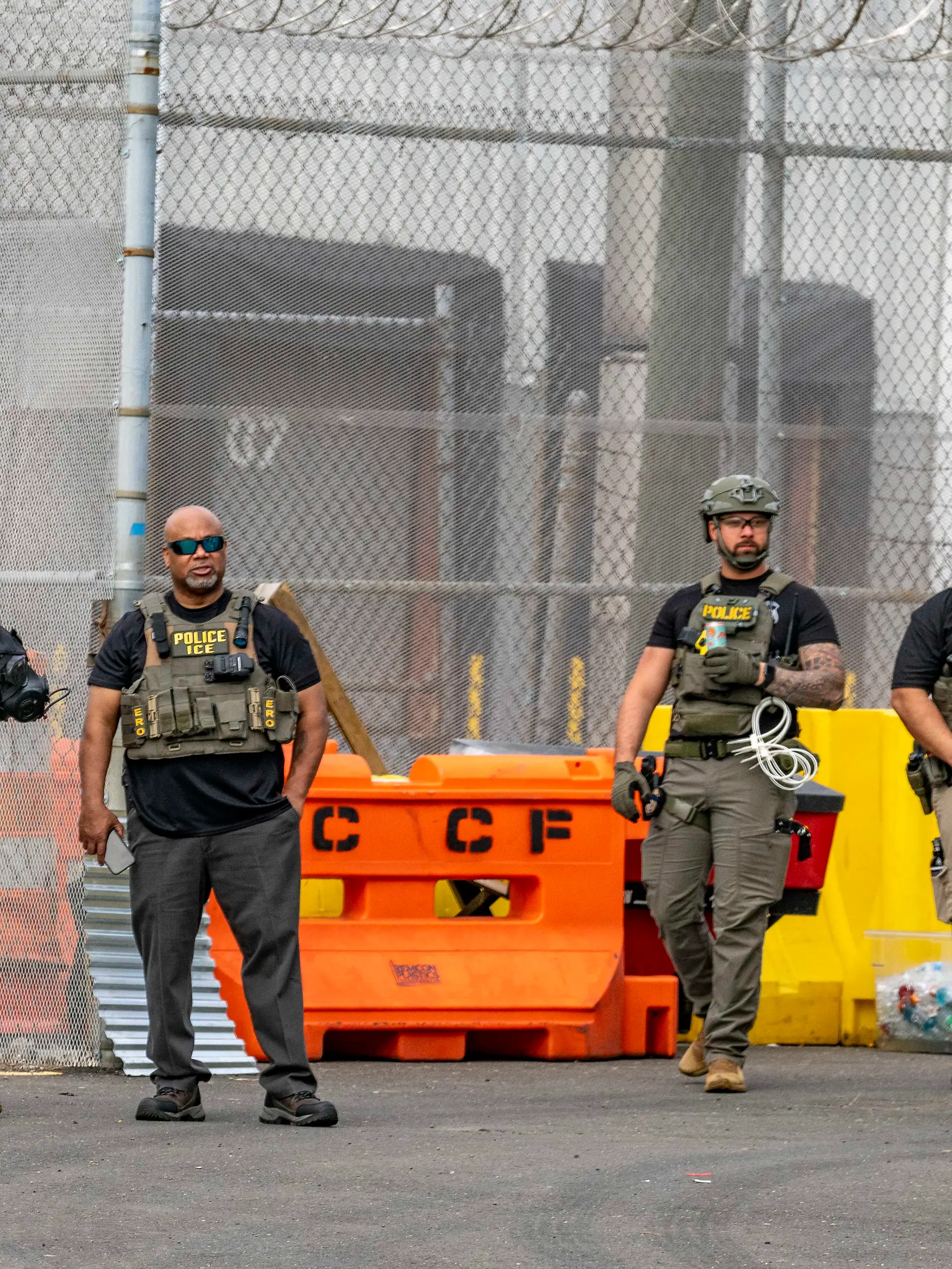 May 27, 2026, Newark, New Jersey, USA: ICE agents wearing bullet-proof vests stand outside of Delaney Hall ICE detention center as detainees inside continue their hunger and labor strike over inhumane conditions and due process violations. Supporters of the detainees are nearby. (Credit Image: © Sue Dorfman/ZUMA Press Wire